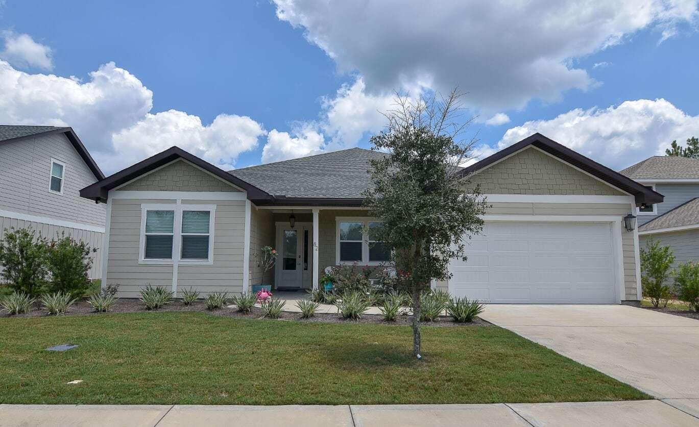 This custom home has all the upgraded features that you expect in a one-of-kind high quality residence! Located with a pond to the rear and on a quiet street in a lovely Hammock Bay neighborhood, this is your own spacious retreat. 10 ft. ceilings throughout with an 11 ft. ceiling in the family / living area and tall doors, shiplap and other wall finishes throughout are just some of the homes special touches. With a split floor plan, all bedrooms and the master are over sized with the master boasting a tray ceiling and a master bathroom with beautiful tile work, a unique walk in shower with multiple shower heads and a separate soaking tub.
Dual vanities in the master feature custom lighting and the adjoining master closet is massive! The kitchen features all stainless appliances, real wood cabinetry and spectacular granite surfaces. The large pantry can accommodate supplies, foodstuff and equipment to suit the most discerning and demanding cook with a large family or a penchant for entertaining!. The rear yard is fenced with a large covered patio and the rear fencing provides a full view of the pond beyond. Please take time to look at the accompanying photos!