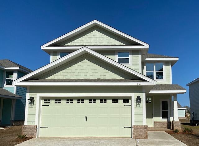 You'll love this two story with master suite on first floor! Enter thru the foyer with lots of natural light coming thru large second floor window; continue thru archway into open kitchen, living room, and 1/2 bath. Upstairs to three spacious bedrooms that share a large full bath, while the 4th upstairs bedroom (15'x15') has its own private, full bath.  Granite countertops, rear covered porch (7' x 13'). CoreTec Pro Plus luxury vinyl plank flooring on entire main floor and in wet areas on 2nd floor, garage opener included, sprinkler system + well & pump included. Turn right out of Riverwalk and you are only 4 miles to the bridge that leads to the beautiful beaches of South Walton!
