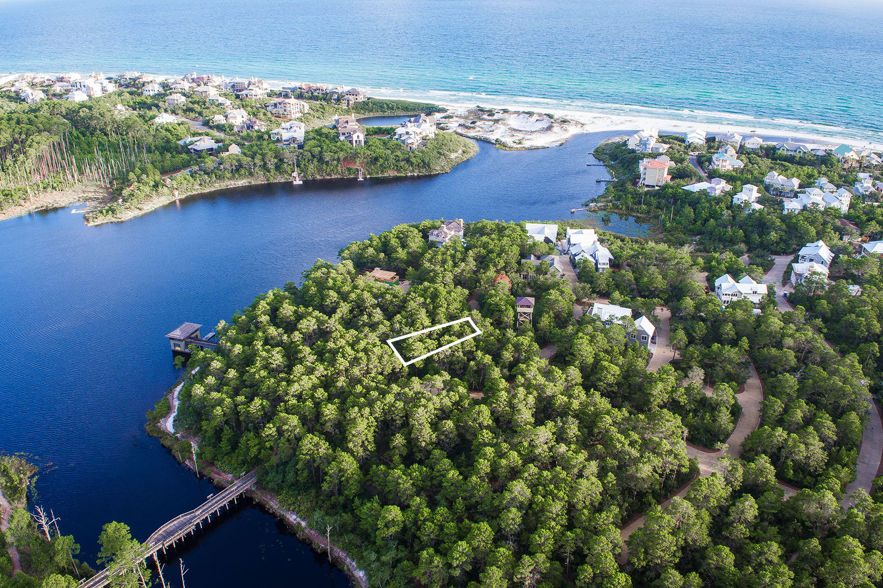 This beautiful rear loaded homesite is located on the western peninsula of Draper Lake, bordering the natural preserve area. Just steps away from the coastal dune lake, residence will have immediate access to scenic walking trails, 5 green areas for common use, a community pool, boat dock and a 40-foot observation tower capturing stunning panoramic views of the emerald waters of the Gulf Coast. As indicated in the Draper Lake design code, this lot will have a Type 1 house layout.