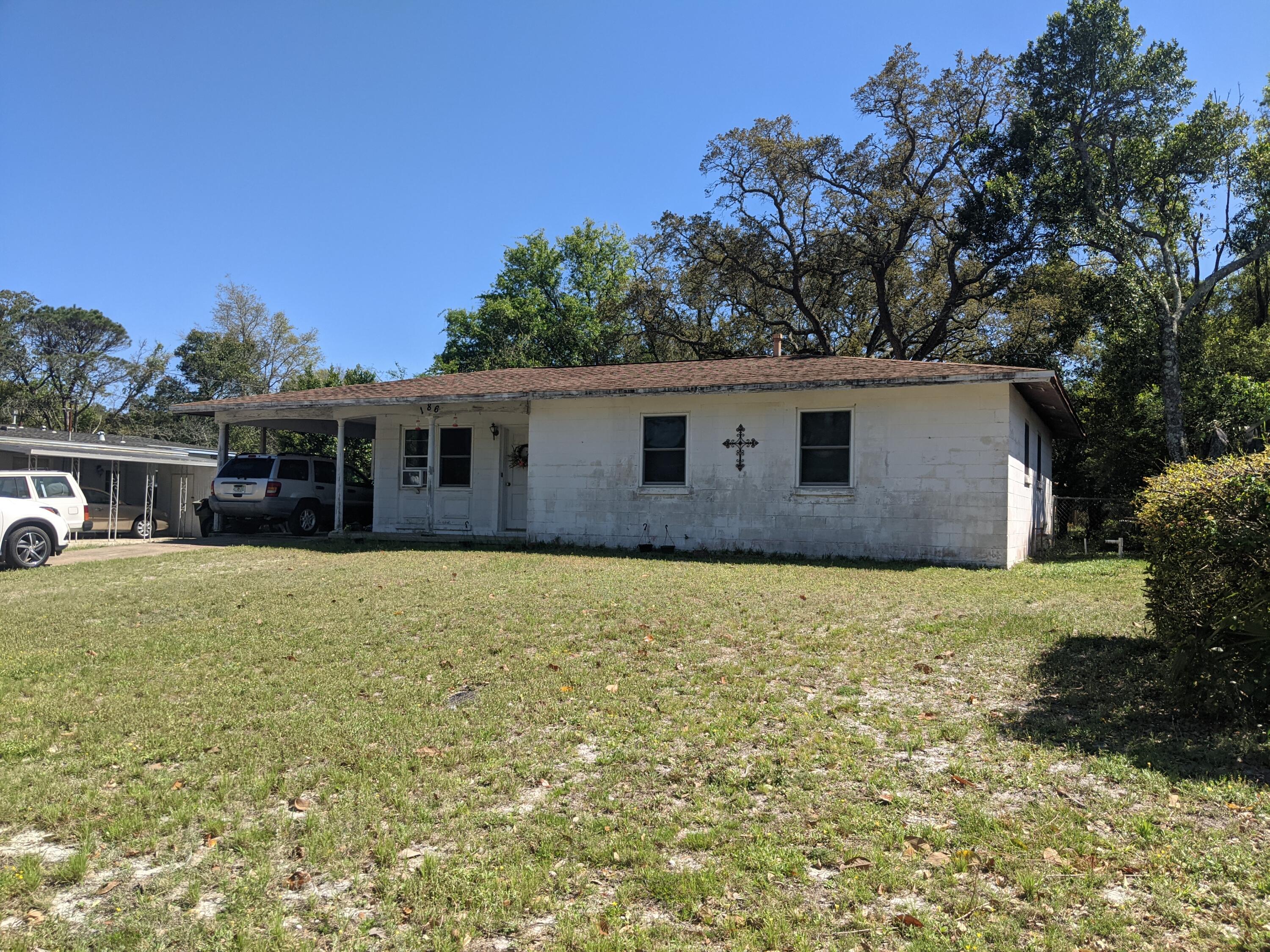 This block beach house is ready for a cash investor who sees the great opportunity. Needs a roof, HVAC and interior work, but has excellent potential.