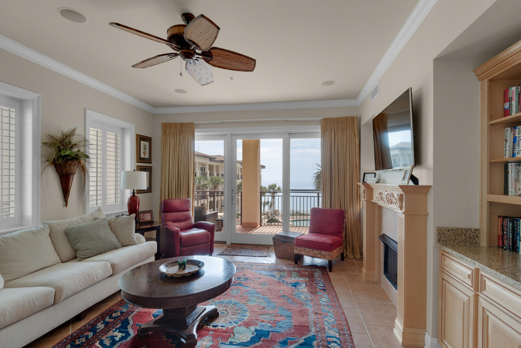 Welcome to A203! Rarely does a Bella Vita residence become available in Building A, the westernmost gulf front building, with only 12 luxury condominium homes. A203 is convenient to the Sunset Deck for grilling, the pools, of which one is heated, and the expansive beach. Beautiful 3 bedroom (en suite) 3.5 Bath, A203, rises above the stunning piazza, sparkling swimming pools and captures fabulous views of the azure gulf waters.  The piazza's fountain is over 61 feet above sea level which is the highest point on the US Continental Gulf Rim.  Gated Bella Vita in Blue Mountain Beach comprises a total of 48 residences with 365 feet of beach on approximately 6 acres, a Great Hall with conversational seating, a Library, excellent Fitness Center and porte cochere. Let the sunshine in as light floods this end residence with 4 windows overlooking the piazza's fountain. While away the day on the wide 358 sq. ft. veranda which provides ample space for outdoor living.  The living room and master bedroom let on to the oversized veranda. Gulf views unfold before your eyes from the kitchen, dining, living room and master bedroom suite.  There are only 4 residences with the C plan which offers a foyer entry with cloak closet, gas fireplace, custom built ins, wet bar with ice machine, separate laundry room with cabinets and countertop space, powder room, and outside storage at the front door entry as well as ample garage parking. The kitchen with breakfast bar marries the living and dining room and features a pantry, a five burner Dacor gas cooktop, built in microwave, oven, warming drawer, Sub Zero refrigerator with panels, Asko dishwasher and Linn's Prestige Kitchen custom cabinetry with hidden appliance caddies.  The Master Bedroom Bath offers a large walk-in closet, dual vanities, separate jetted tub, separate shower and water closet.  Association fees include all utilities except electricity. There are 108 parking spaces at Bella Vita. The Great Hall featuring a library and kitchen is located on the second floor of Building B as is the well-equipped Fitness Center set up to encourage work out enthusiasts to stay fit while at the beach. The gym is received at $80,000 remodel! Bella Vita is steps away from various eateries including a bakery, and health food store.  Convenient to Bella Vita on Blue Mountain Road is the 30A bike path, bike shop, donut and ice cream shop and shopping.  Don't miss this opportunity to own A203 at Bella Vita....the Beautiful Life where the lifestyle is all about family, entertaining and effortless beach living.