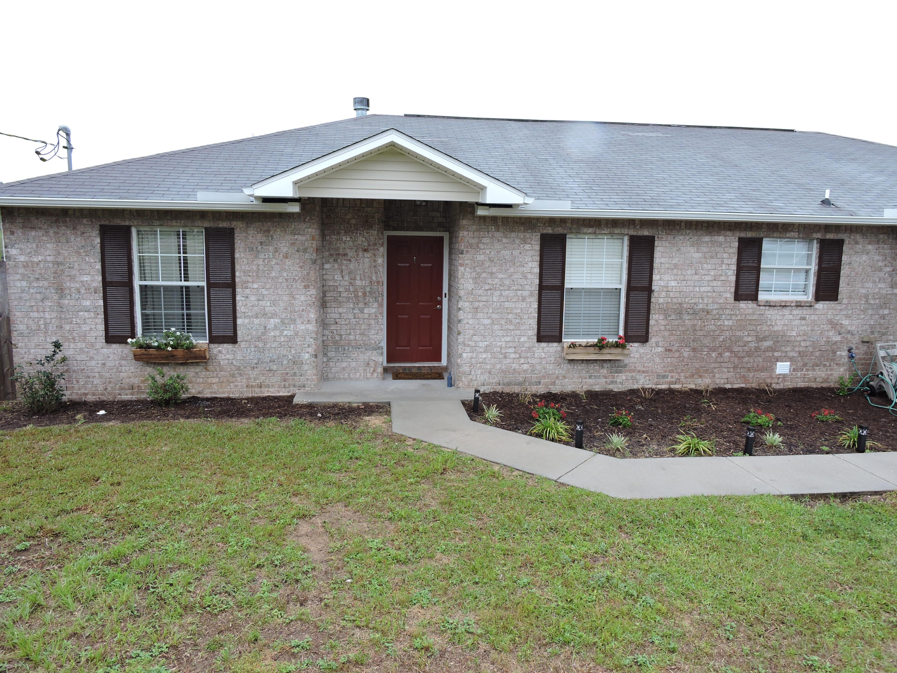 Come view this well maintained 3bed/2bath home where ''Pride of Ownership'' speaks for itself. Located South of I-10 in the sought after neighborhood of Countryview Estates. This beautiful home features new wood look tile floors thoughout the main living area/kitchen/hallways. The galley style kitchen features stainless steel appliances, new light fixtures, white cabinets with crown moulding, and a herringbone design in the tile floors. The large family room is accented with a wood burning fireplace and cathedral ceilings. The
large master suite features in carpeting, his/her closets and dual vanities in the master bath with new light fixtures, mirrors, and bronze plumbing fixtures. The additional bedrooms feature new carpeting, nice sized closets with a well appointed hall bath separating them.  A one year home warranty is being offered for the new buyers piece of mind.  Buyer to verify all information pertinent to them. Schedule your showing appt today.