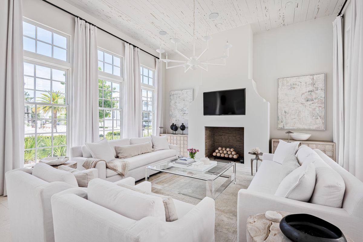 Iconic location and inspirational design join to craft one of the most pristine offerings to come to market in desirable Alys Beach. Drawn by Jason Dunham, and built to the superior standards of ARKON construction, this 3,431 square foot home provides the charm and whimsical detailing that the community is famed for, while also providing a crisp and clean contemporary interior, rarely seen executed to the level of finish this property showcases. The main level encapsulates an open living space, flanked by floor to ceiling windows to the east and the west, while a formal dining space flows into the chef's kitchen, fully furnished with Thermador appliances, floating shelving, custom cabinetry, and quartz countertops for a modern take on coastal luxury. The first floor master suite provides ample space showcased with custom tile work and imported fixtures, while the oversized courtyard and plunge pool is available from the master suite as well as through the french doors of the kitchen space. A private two-car garage provides access to the home from it's namesake street, Hog Penny Aly, while the Caliza Pool entrance sits only footsteps from the eastern entry on N. Somerset. 

Warm oak flooring offers dimension to the custom carved staircase and sleek venitian plaster walls, while the second level of the home offers a second master suite, two additional guest bedrooms, a second living space, a kitchenette with transitional seating, and access to the upstairs terrace, ideal for watching the sun rise, or set, over the rooftops of this mesmerizing neighborhood.