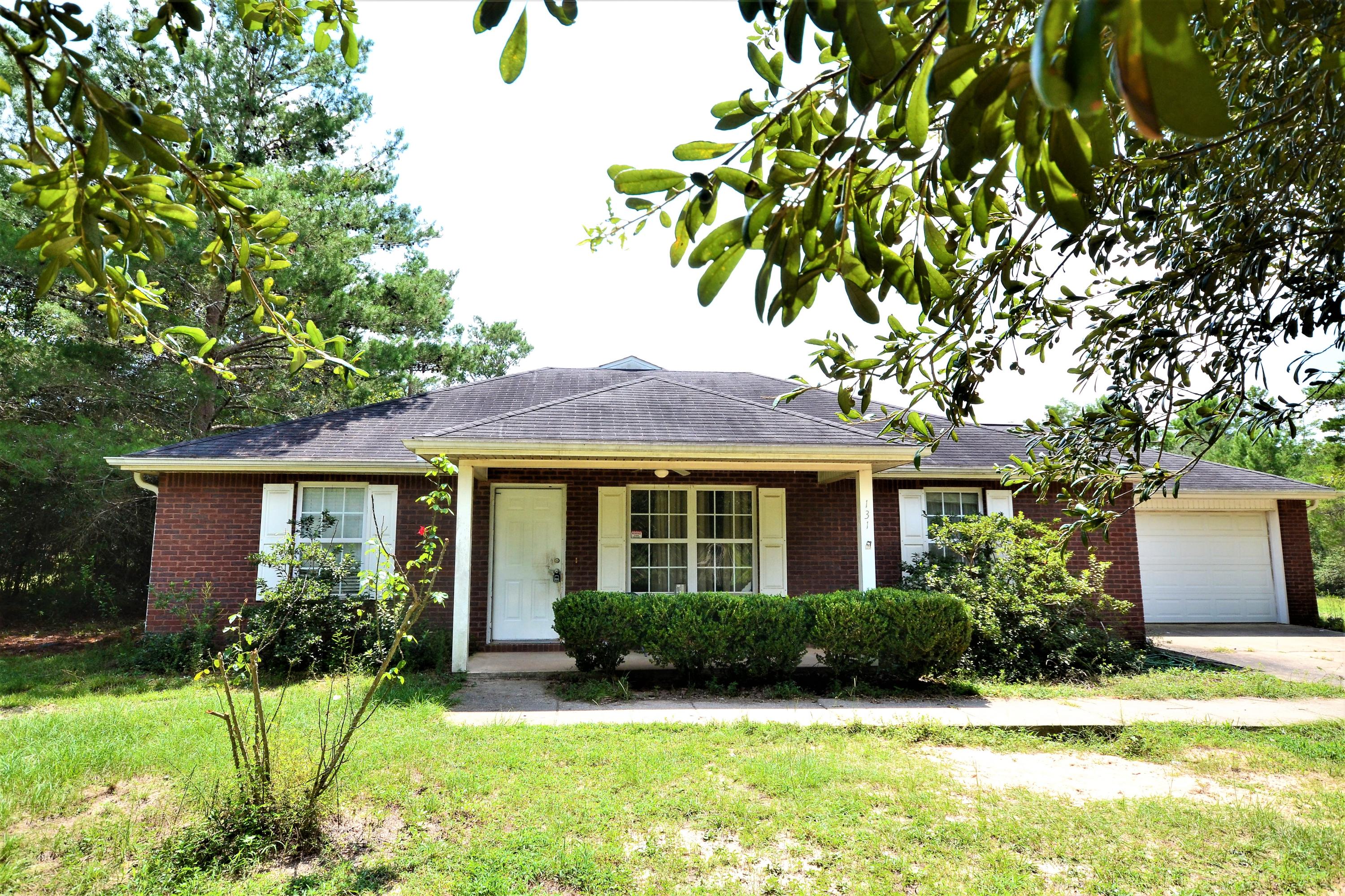 ONLY $194K... AFFORDABLE for more room than you can imagine!! This 5 bedroom, 2.5 bathroom brick home has TWO LARGE living areas, open kitchen/dining area and a split floor plan with a MASTER SUITE. In-Ground Chlorine Pool for relaxing with a covered back porch overlooking the beautiful pool and large back yard. Home is situated on this huge, rectangular 2.50 acres! Put up some beautiful fencing and let your HORSES RUN FREE while grazing this green pasture!! If you're looking for peace and quiet, country living at its best, a place to plant a true vegetable garden to feed your family, recreational areas surrounding this home, 4-wheeler riding fun AND a homestead that allows all your pets and horses to be included... let's sign the papers!!!!
