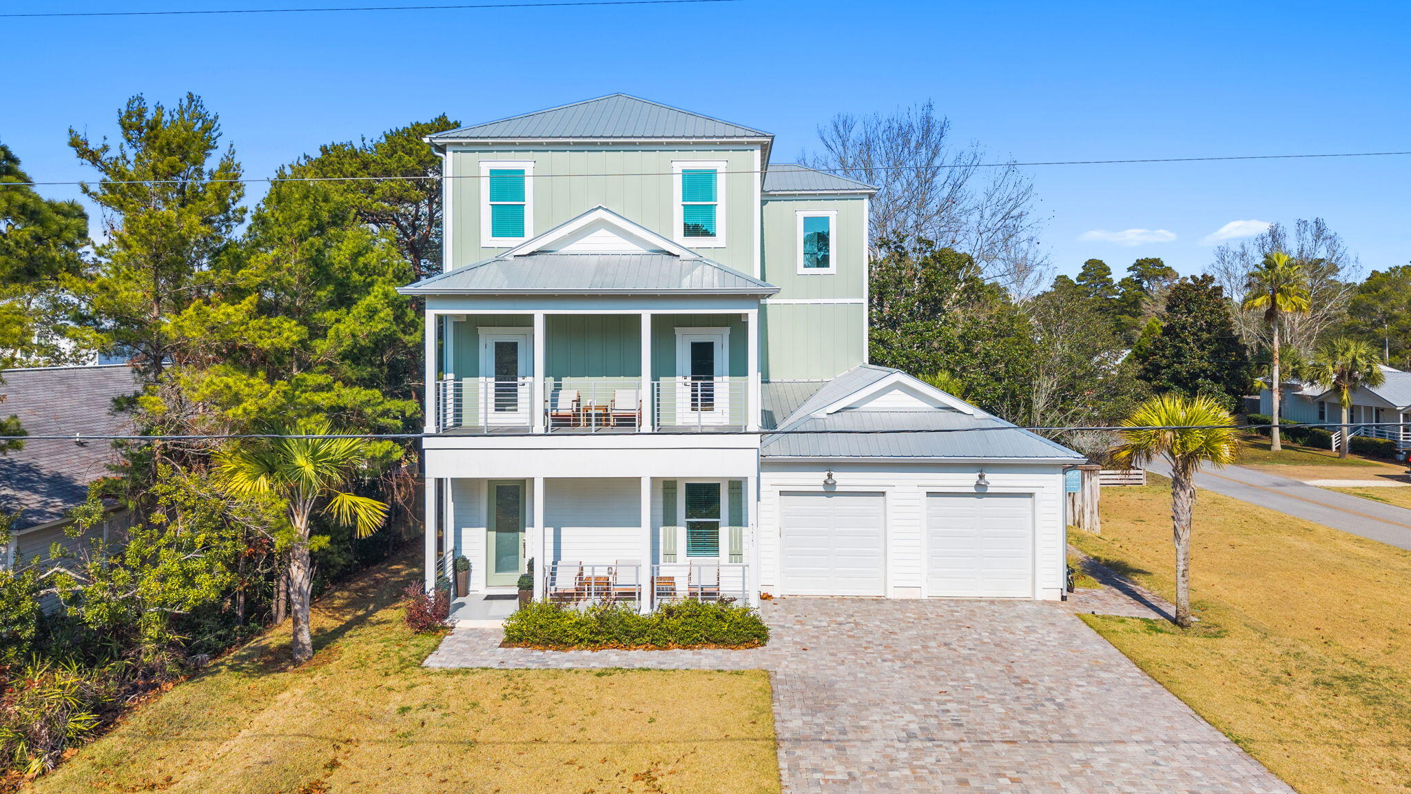 In its first year on the rental market in 2024 the actuals were $148,222, increasing to $161,519 in 2025. Experience refined coastal luxury at 111 Walnut St., a 6 bedroom, 5.5 bathroom residence on a prominent corner lot with no HOA. The first floor checks all the boxes! Designed for elevated living and exceptional rental performance, this three-level home offers an open-concept layout, a chef's kitchen with quartz countertops, premium stainless appliances, and an expansive breakfast bar. Outdoor living shines with a private pool, fenced yard, and generous covered porches. The oversized 3 car garage includes dedicated golf cart space for effortless access to nearby Gulfview Heights beach and Gulf Place. Turnkey and impeccably positioned along the west end of 30A. a breeze. Located just moments from the shops and dining of Gulf Place, this property is a turn-key investment or a dream home on the West End of 30A.