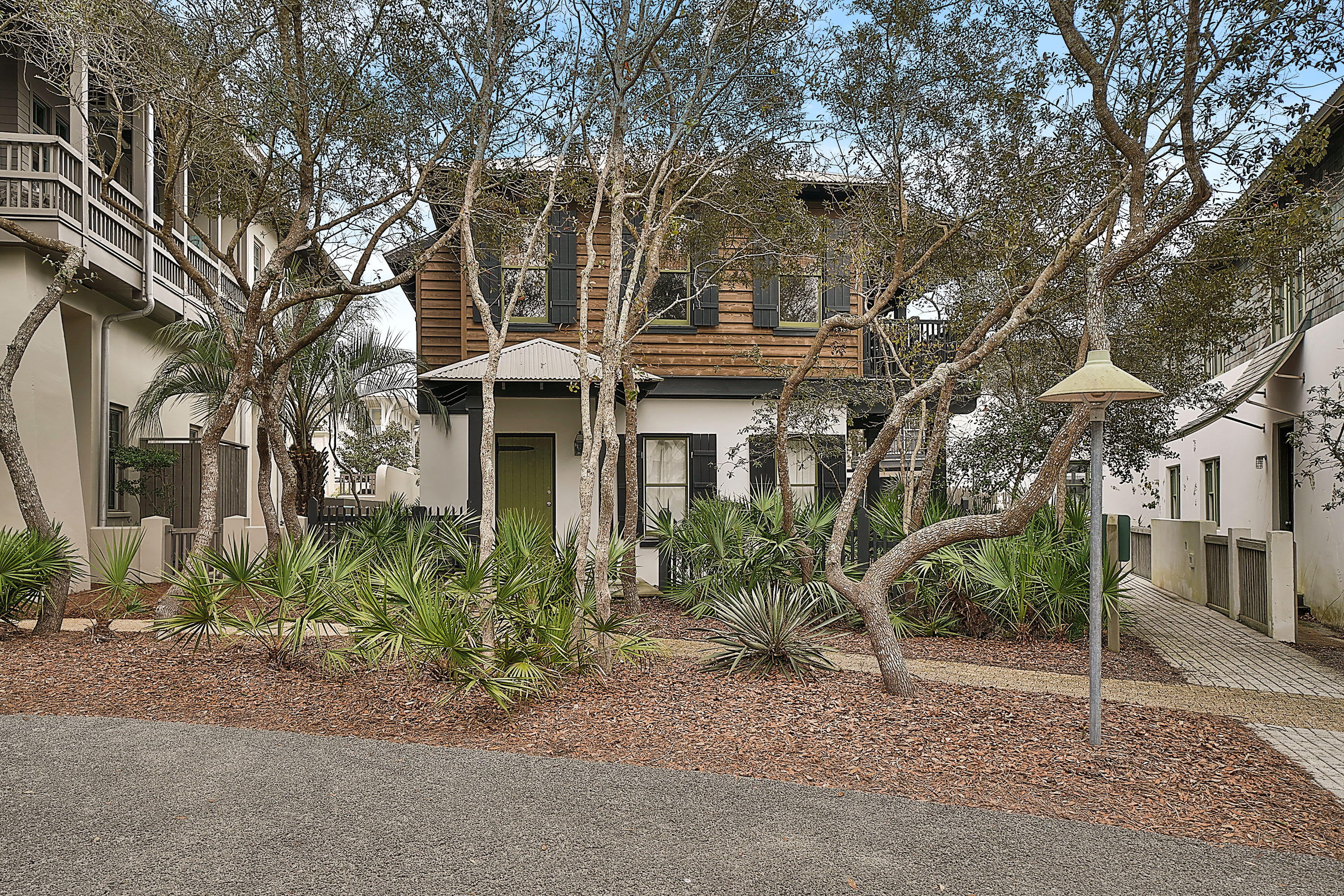 One of the first homes built in Rosemary Beach, 319 E. Water Street is all about location. Less than a minute walk to the Coquina Pool and about a minute and a half to the beach walkover leading to the stunning Gulf of Mexico. Dining and shopping are easy too as the Rosemary Beach Town Center is just a short walk away. Small in stature compared to the newer constructed homes, 319 E Water will leave you nostalgic for easy living and simpler times. Sited on a larger lot, there is also room for improvements should you so desire - a first floor addition perhaps or a garage/carriage house and still ample room for a lovely outdoor space. The star of the show is the large, open 2nd floor living, dining, kitchen area. Beams and an expansive metal ceiling give a tropical flair.