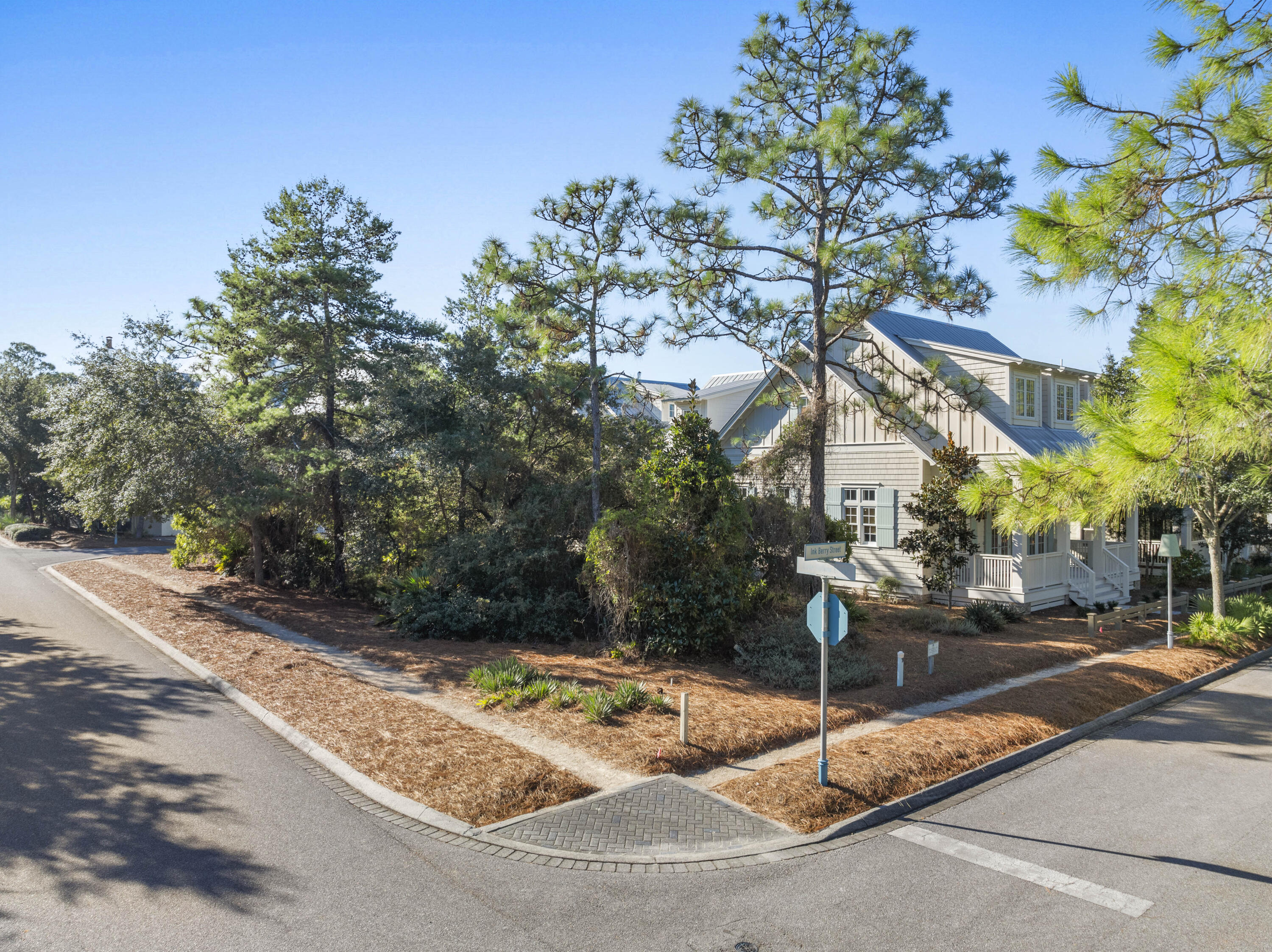 Don't miss this rare opportunity to build a brand-new home on one of Watercolor's few remaining lots in the highly desirable phase III (where short-term rentals are allowed).  This generously sized corner lot overlooks Longleaf Park with tranquil views of the state forest beyond and just steps away from Watercolor's famous neighborhood Frog Pool.  Perfectly situated in a secluded area, yet just minutes away from the hustle and bustle of 30A and all that Watercolor and Seaside have to offer.  Watercolor remains one of Scenic 30A's most exceptional planned communities, renowned for its unmatched amenities, from the world-class Beach Club, kid friendly Camp Watercolor, highly acclaimed tennis center and workout facility, Western Lake Boathouse and miles of scenic walking and biking trails. Neighboring Seaside, the iconic 30A beach town, is just a short stroll or bike ride away, offering some of the area's finest dining and boutique shopping. This is a truly special opportunity to build your dream home and experience the very best of 30A coastal living in one of its most sought-after locations. Fully approved architectural plans by Greg Jazayeri Design for a 2-1/2 Story, six-bedroom, six-bath main home and carriage house are available, yielding more than 4,200 square feet of beautifully designed living space, plenty of room for the entire family.  Start construction right away, or design your own custom beach getaway.  The possibilities are endless.