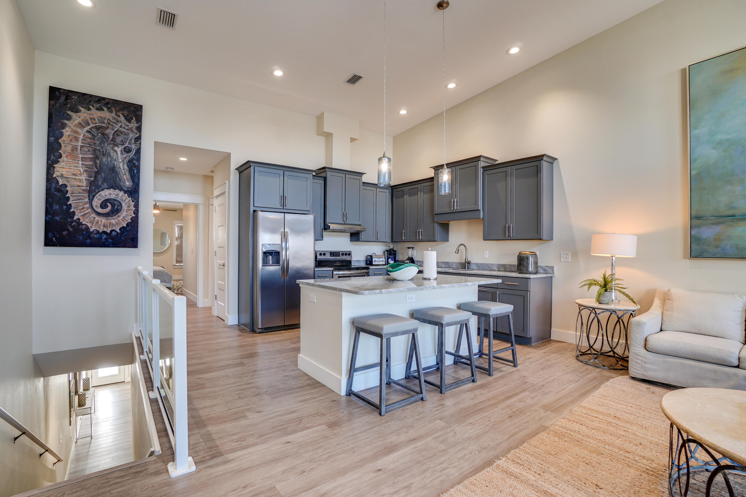 This modern, FULLY FURNISHED sound-side townhome boasts its own boat slip, garage, and upscale finishes. Located within walking distance to the beautiful white sand beaches of the Emerald Coast, and a short boat ride away from the world famous crab island. Each residence includes a 28' by 12' boat slip, lofted 14' ceilings in the living area, high impact windows/doors and metal roof. This unit includes stainless steel appliances, granite countertops, and a beautiful view of the sound. Additional amenities include a private community pool with sun deck, private one-car garage, and private dog park. Whether you are looking for a primary residence, second home, or rental property, this unit is the perfect place for you!