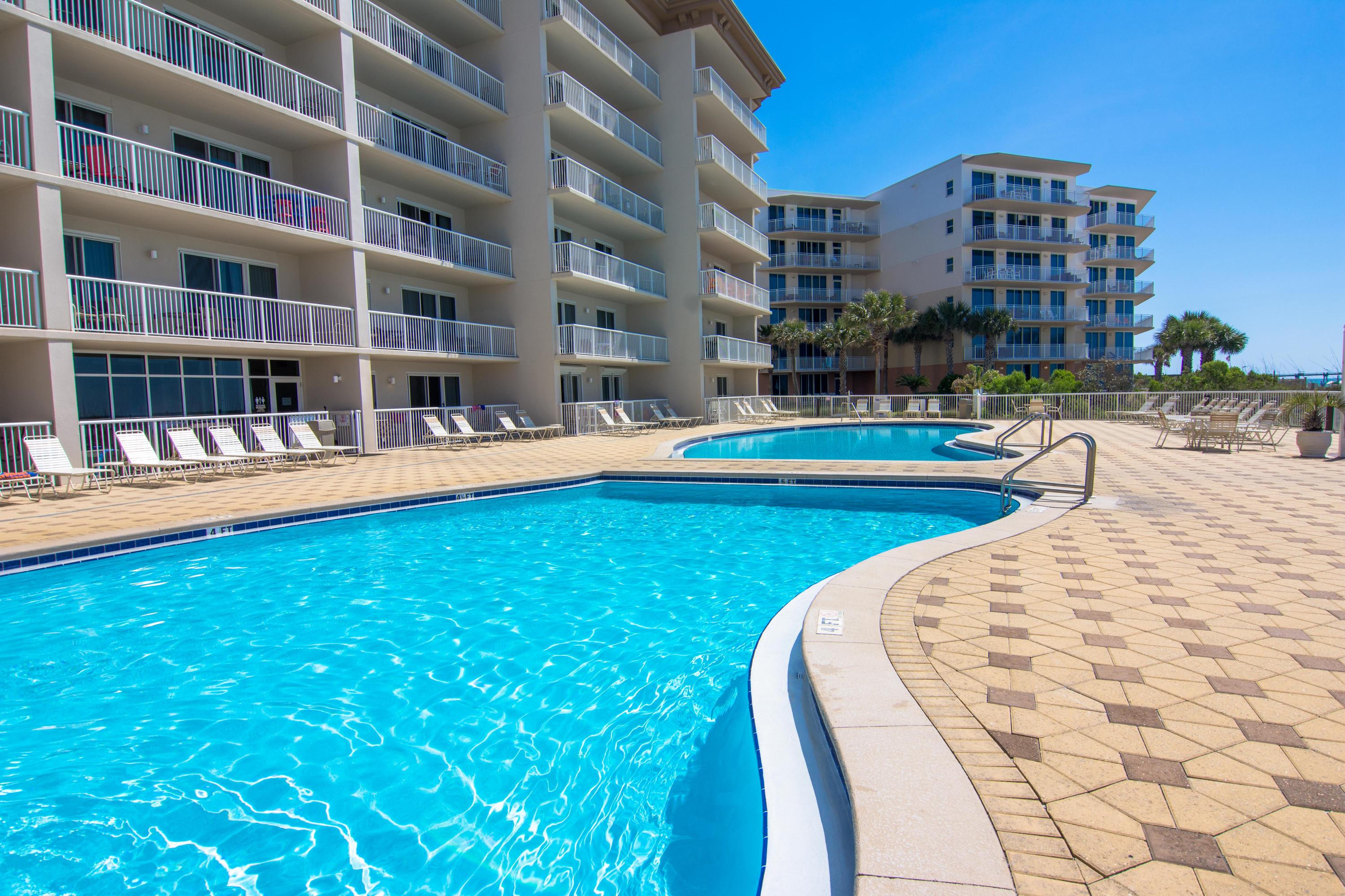 $40-45K rental history! The beach getaway you've been dreaming of... a 3 bedroom, 3 bath rental machine at Summer Place with seaside inspired interiors and beautiful Gulf front views. Sunshine and warm gulf breezes and views abound from the balcony, accessed from both the living room and the master suite. The gourmet kitchen features granite counters, loads of cabinet space and is fully stocked and rental ready. Upgraded tile floors throughout - no carpet! Enjoy the good life at Summer Place with resort style amenities including: 2 Gulf front swimming pools (one seasonally heated), hot tub, fitness center, lush grounds, bbq grills and of course the beautiful beach just steps from your door. This condo has a 5 star VRBO rating with a long history of happy guests. Amazing location within walking distance or a short car ride to some of the best restaurants, shopping and entertainment with fewer crowds than Destin but just a few miles away.