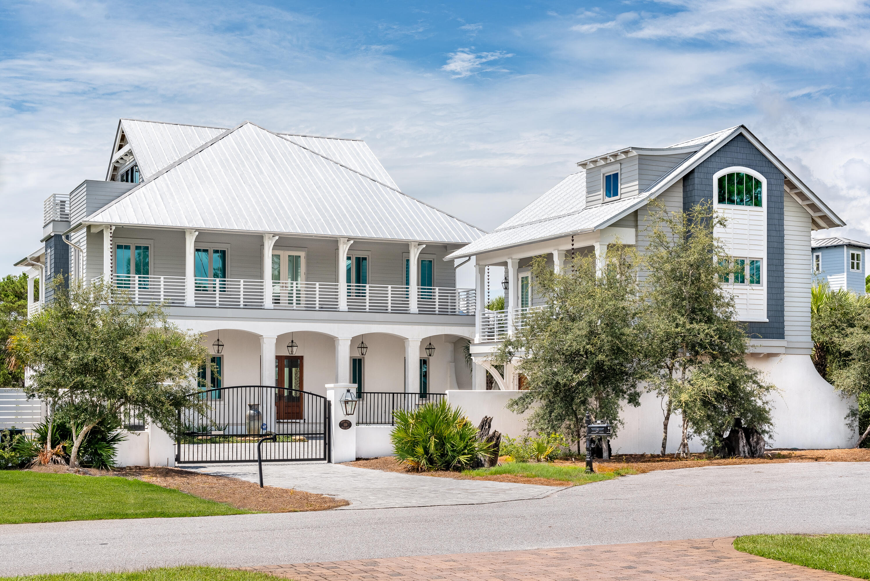 Located just steps to the beach, this ideal location offers privacy and serenity while still being a short bike ride from all the fun. Drive through the private gate of 159 Brenda Lane and you'll find a gorgeous coastal masterpiece. Built like a fortress the first floor of this home is constructed out of concrete block. Featuring 6 bedrooms, 9 bathrooms, a game room, a media room, a wine cellar, elevator, carriage house, and gym there is no shortage of space for family and friends. Custom-built in 2018, every detail was crafted with the utmost of luxury in mind. Including first-floor chef's kitchen outfitted with Wolf and Subzero appliances perfect for the chef in the family. 

Have family or friends stay in the carriage house; featuring 2 bedrooms, 2 bathrooms a living room, and a full kitchen. Enjoy the private pool and outdoor gas fireplace, Golf at Camp Creek Golf Club right around the corner, or head to the deeded beach access across the street only one block away. 159 Brenda Lane offers luxury and space, while just a short bike ride away from the best that 30A has to offer!