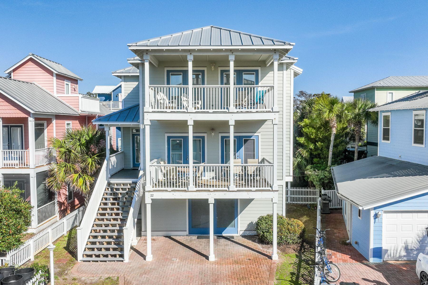 This quintessential beach house enjoys lovely breezes and views of the Gulf of Mexico sitting just three houses back from the beach. Nestled in the gated neighborhood of Sunrise Beach, on the south side of 30A, you have easy access to the beach with two beach walkovers maintained by the HOA.  The home boasts a private pool and charming backyard for lounging after walking the beach.  You'll find a huge gaming area on the first floor complete with air hockey & ping pong tables as well as  bunks and a guest bedroom and bath.  The built-in trundle bunks make into four beds.  The main living area with fireplace and kitchen are on the second floor for best Gulf views from the balcony, and the guest bedroom on that floor also has a balcony and adjoining bathroom. The top floor showcases the primary suite with fireplace and balcony for best Gulf views. There is an additional queen bedroom on the third floor with both balcony and bathroom. Many new additions were made to the house in 2019: 
a new heavy duty metal roof of 26 guage standing seams, along with all hardee board exterior and decks replaced with stainless steel nails, and a renovation of the primary bathroom and flooring throughout and a pool pump.  Balcony railings and fence were replaced in 2018.  The washer & dryer were replaced in 2020, and most kitchen appliances were replaced too. In 2021, all new hot water heater & HVAC units were replaced.  The house has natural gas piped to it, but it is only using electric, not gas with current appliances.  Irrigation for the property uses the HOA's common well, so no direct cost to the owner. The owners rent the home through Dune Allen Realty; however, they reserve all holiday weekends, spring breaks, etc. for their family. Sunrise Beach is located next to Ed Walline Park and across from the popular eateries of Shunk Gulley and Papa Surf Burger.  Park your car for vacation and stroll to shops & restaurants.