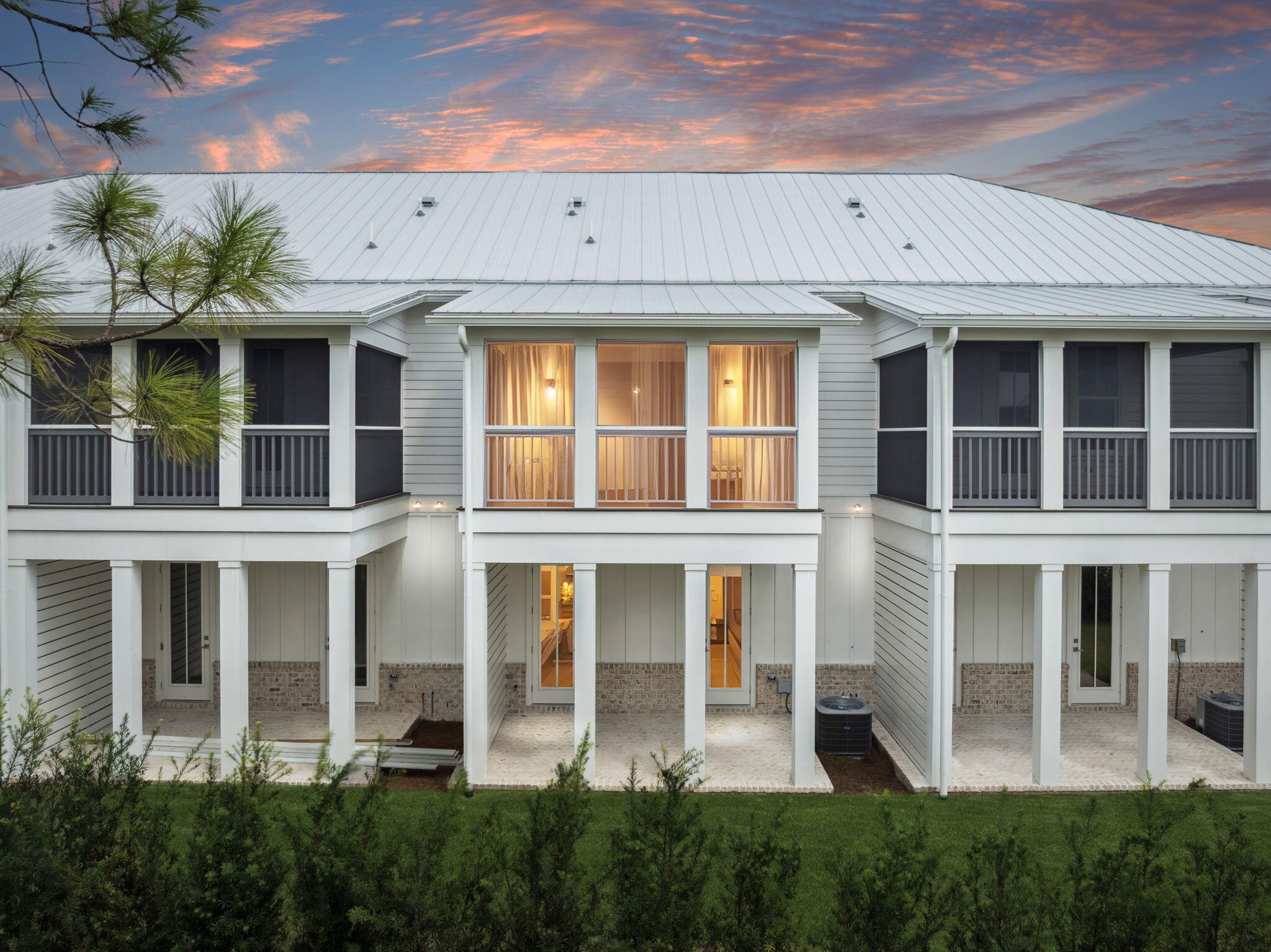 Motivated Seller offers price improvement on fully furnished model townhome! This new construction townhome at Cottage Grove is located 1.3 miles from the beautiful beaches, restaurants, & shopping of 30A. Luxury interior finishes include engineered wood floors, quartz countertops, tile backsplash, shaker-style cabinets. Solid core 8' bedroom doors, sound control insulation, 10' ceilings throughout, & smooth finish drywall. Upgrades include epoxy garage floor and plantation shutters. Downstairs entry into the foyer leads to two bedrooms with ensuite baths; one with a tub-shower combination & the other with a walk-in shower. Included downstairs is a laundry room, & access to the back porch. Owners will enjoy a one car garage with storage space as well as extra storage under the stairs. Upstairs has a large great room with living and dining space that leads to an upper porch. The kitchen boasts Kitchen Aid commercial style appliances including a 30" Dual Fuel Cooktop, Wall Microwave, Vent Hood, Dishwasher, and French Door Refrigerator.
The owner's suite features a large walk-in closet with wood shelves, and a master bath with linen closet and walk-in shower. Amenities include a community pool, grill, and restrooms. Short term rentals are not allowed, making this an ideal primary residence or second home with the ability to rent monthly, seasonally, or yearly.