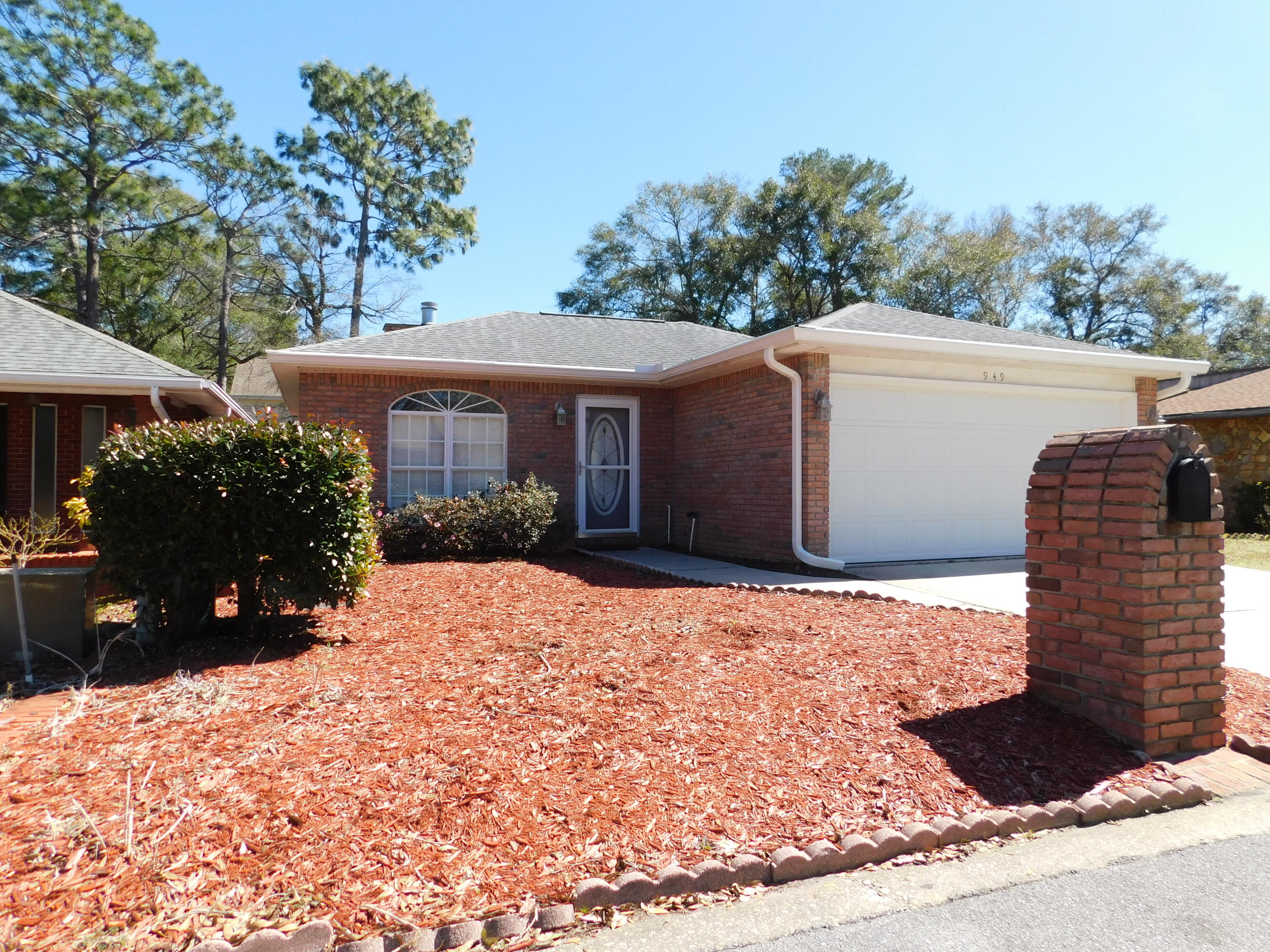 No grass to cut!! This almost handicapped equipped home is within 1 mile from Ft. Walton Beach Medical Center, White Wilson Clinic, Emerald Coast Surgery Center.  Minutes from Wal Mart, Lowes, and  Sam's. This spacious open floor plan with coffered ceilings in living room and dining area and skylights in both baths and kitchen provide loads of natural light throughout. Dinning room can be converted to third bedroom with minor remodeling. Wide doorways and hallway to bedrooms and bath make it  wheelchair accessible.  Open stained wood patio gives an abundance of outdoor privacy. Granite counter tops in kitchen, cultured marble shower and vanities, freshly painted and 7mm vinyl plank flooring through out, Kitchen and bath have ceramic. Underground utilities and brick mailbox to boot. NO HOA.