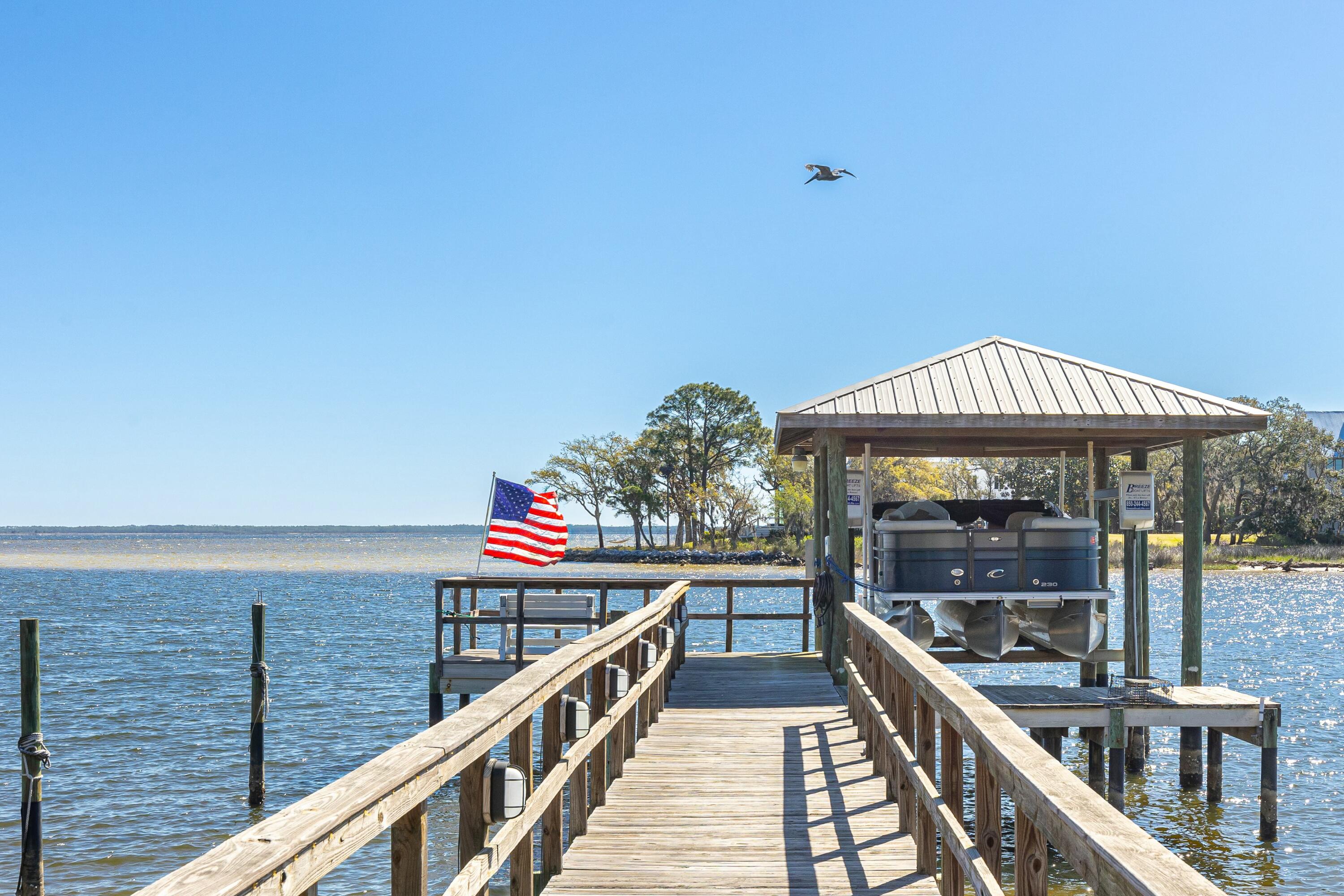 Discover your own private waterfront retreat, perfectly positioned with deep waters on the Bayou/Bay! This single-level home is the gateway to the ultimate Florida lifestyle. With over 30 restaurants accessible by boat, your days on the water are limited only by your imagination. Cruise to Crab Island in just 30 minutes or reach the Sandestin Marina in only 10. Cast a line from your private dock and reel in a variety of fish, all while enjoying peaceful mornings with breathtaking sunrises. Watch ospreys dive for their catch, bald eagles soar overhead, and dolphins make daily visits right up to the seawall.

This exceptional home also features a dedicated office, perfect for remote work or managing daily tasks, and a whole-home generator, ensuring comfort and peace of mind no matter the weather. Beyond the water, you're conveniently located just five minutes from the shops and dining of Sandestin's Grand Boulevard and close to Sacred Heart Hospital. In just 10 minutes, you can find yourself on the sugar-white sands of the Emerald Coast and the iconic Scenic Highway 30A!

Don't miss the chance to experience this one-of-a-kind waterfront lifestyle schedule your private tour today!