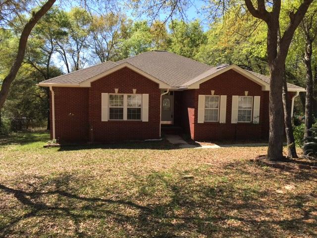 eautiful 3 Bed, 2 Bath, 2 Car Garage all brick home on 1/2 acre lot in the desirable Indian Trails Subdivision. Built in 2003, this home has many custom details including an open floor plan. The Great Room includes Living Room, Dining Room, and Kitchen. The spacious kitchen is a cook's dream, featuring gas cook top, lighted pot rack, lots of counter space, custom cabinets, and in-wall oven. Home has tile and laminate wood flooring in the common areas and carpet in the bedrooms and hallway. The back door leads to a sizable deck and patio and backyard with plenty of mature trees for shade. The master bathroom has a garden tub & separate walk in shower as well as his and her pedestal sinks. All bedrooms have ceiling fans and huge walk in closets