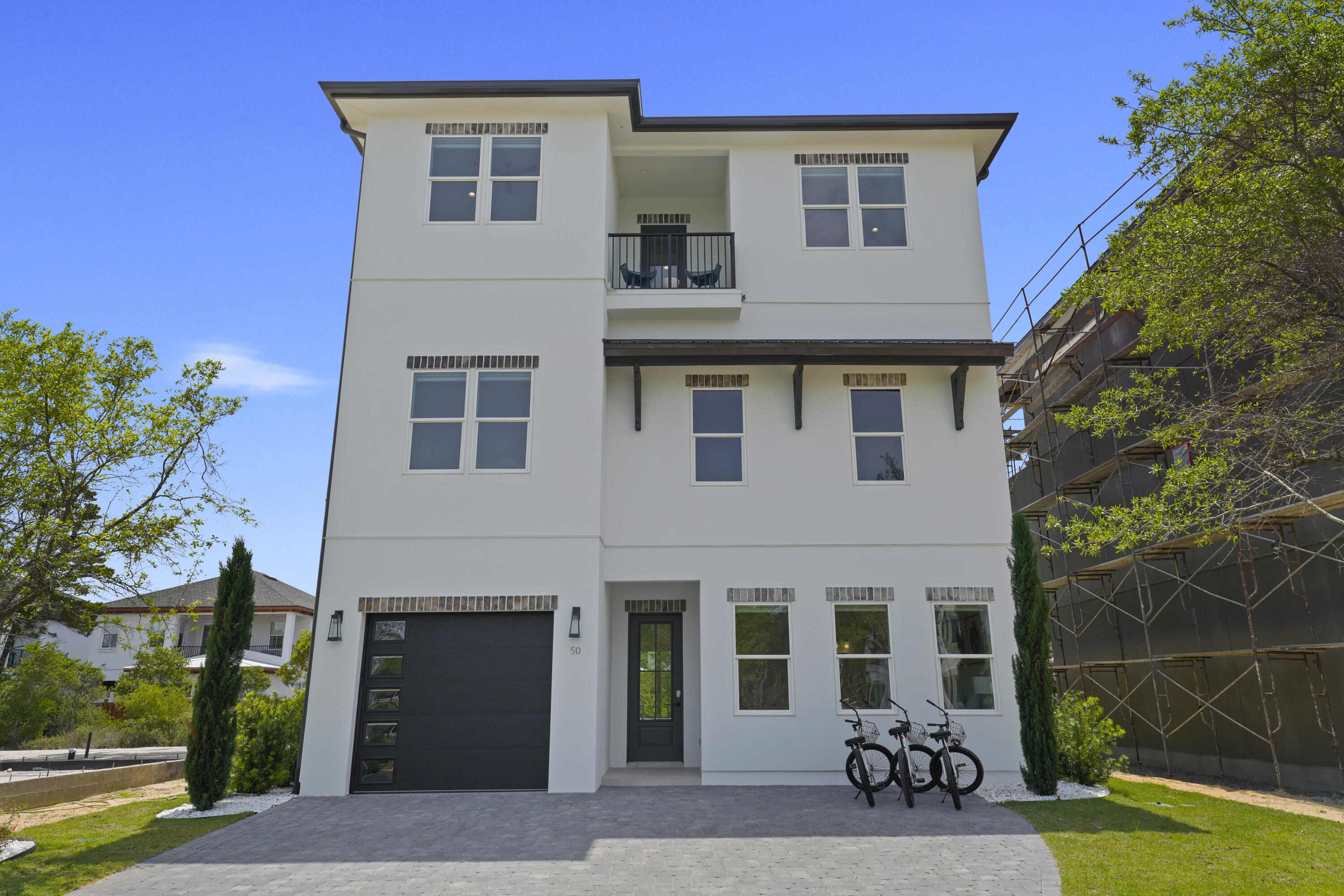 Rare new construction just off 30A. Seacroft Cottages is an exciting new 14 home subdivision tucked just off County Hwy 393 and a short stroll from 30A, ultra-happening Shunk Gulley restaurant, and 30A's widest public beach access at Ed Walline Park. Offered fully and beautifully furnished, no wonder this ''has it all'' home is projected to produce over $200K per year in vacation rental income.