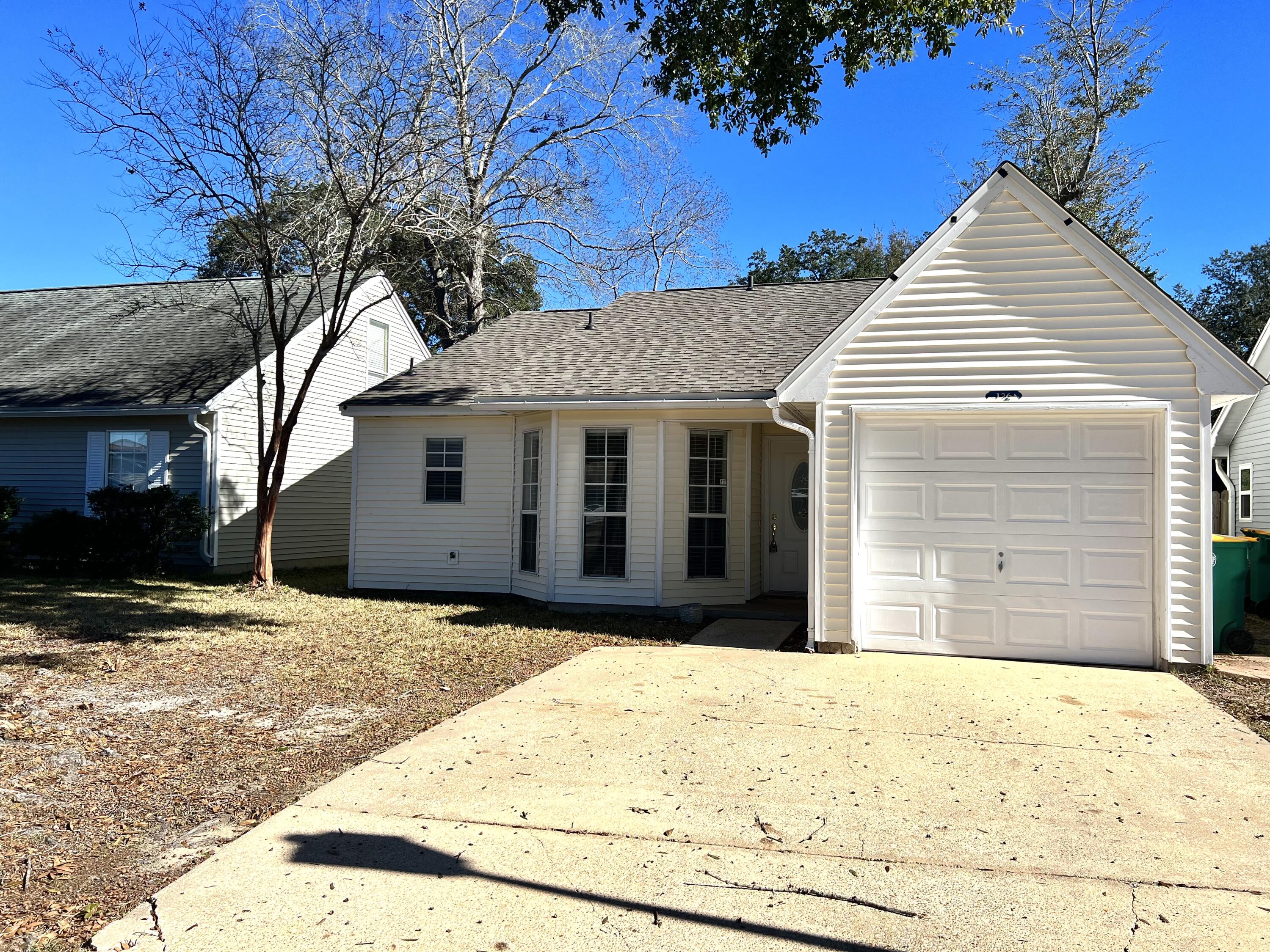Great house in the popular Blue Pine Village. The great room features a cathedral ceiling with center beam & leads to the covered back porch, Home is in neutral color with white trim to make decorating easy. The eat in kitchen with bay window & a pantry has a pass through to the living area for an open feeling. Kitchen appliances include refrigerator, dishwasher & microwave, The spacious master bedroom will accommodate a king size bed & is nicely appointed with a large closet & adjoining master bath featuring a beautiful tiled master shower. The fully fenced backyard offers complete privacy. Amenities of Blue Pine Village include a community pool. Owner will consider a pet.