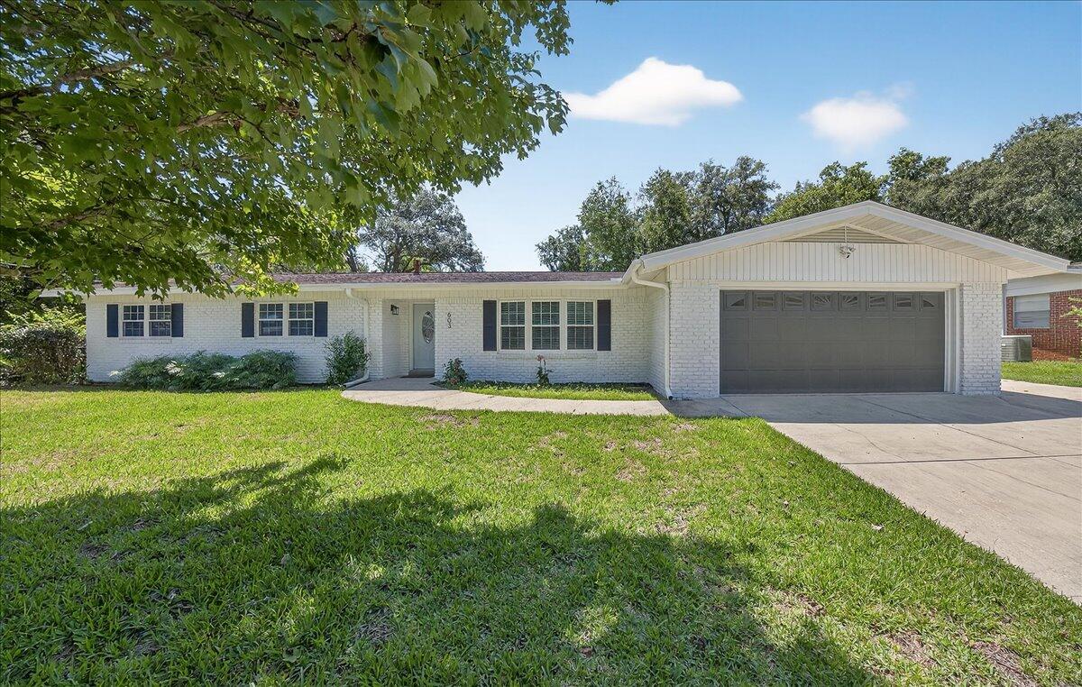 Don't miss this turn key 5 bedroom/3.5 bath beauty! This large, sprawling, ranch home is perfect for anyone looking for some extra space! The beautiful, large, crape myrtle lined corner lot also features a freshly re-lined pool, covered patio, and lots of space to enjoy the beautiful FL weather! The interior features 5 bedrooms, with the option of 2 separate primary suites; perfect for multi generational living, a family looking for more space, or the potential for an income producing rental room! The interior has been completely renovated. Brand new kitchen cabinets and countertops, new LVP flooring throughout, newly updated bathrooms, and of course fresh paint throughout.... this house is move in ready! Major systems ages: HVAC 2023, Hot water heater 2022, Roof 2017.