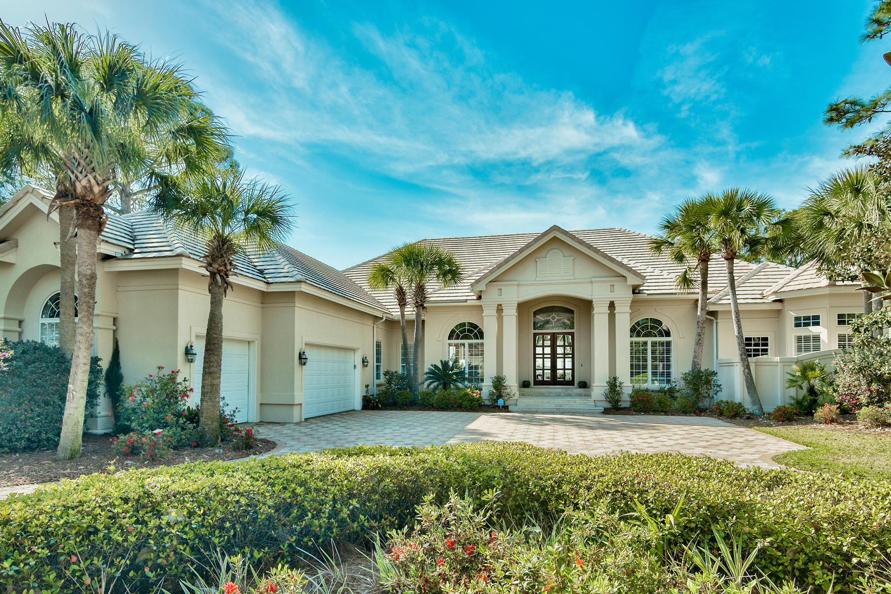 Welcome to an exquisite offering for one of the prestigious waterfront homes in Burnt Pine. This open floor plan includes 4 bedrooms with 4 1/2 baths offering expansive views of the bay while overlooking your private swimming pool with spa and lanai on 108 feet of water frontage. As you enter the driveway of this 4,364 square foot residence, you are greeted with curb appeal galore, including a circular driveway with landscaping and a 3 car garage. Step inside to discover a light and open floor plan, with generous 10 - 14 foot ceilings, a wall of windows facing west boasting unparalleled front row bay views, distinctive architectural detailing and thoughtful appointments throughout. The floor plan is well laid out with formal living and dining areas, spacious chef's kitchen with center island, double oven, granite countertops and breakfast bar that open to the large family room complete with a fireplace and wet bar. Stylish entertaining is guaranteed with the decadent outdoor screen enclosed heated swimming pool, spa and outdoor kitchen all facing the bay and your own dock with boat lift and two jet ski lifts. The striking master bedroom has a sitting area, fireplace and oversized bathroom, along with french doors that lead to the pool area. Three additional guest rooms, including bunk room, make this an ideal home for family living. 

Located in Burnt Pine, described as "The Crown Jewel of Florida Golf," by Golf Magazine, this awe inspiring property is a fine example of Florida living with close proximity to all amenities including top restaurants and shopping.