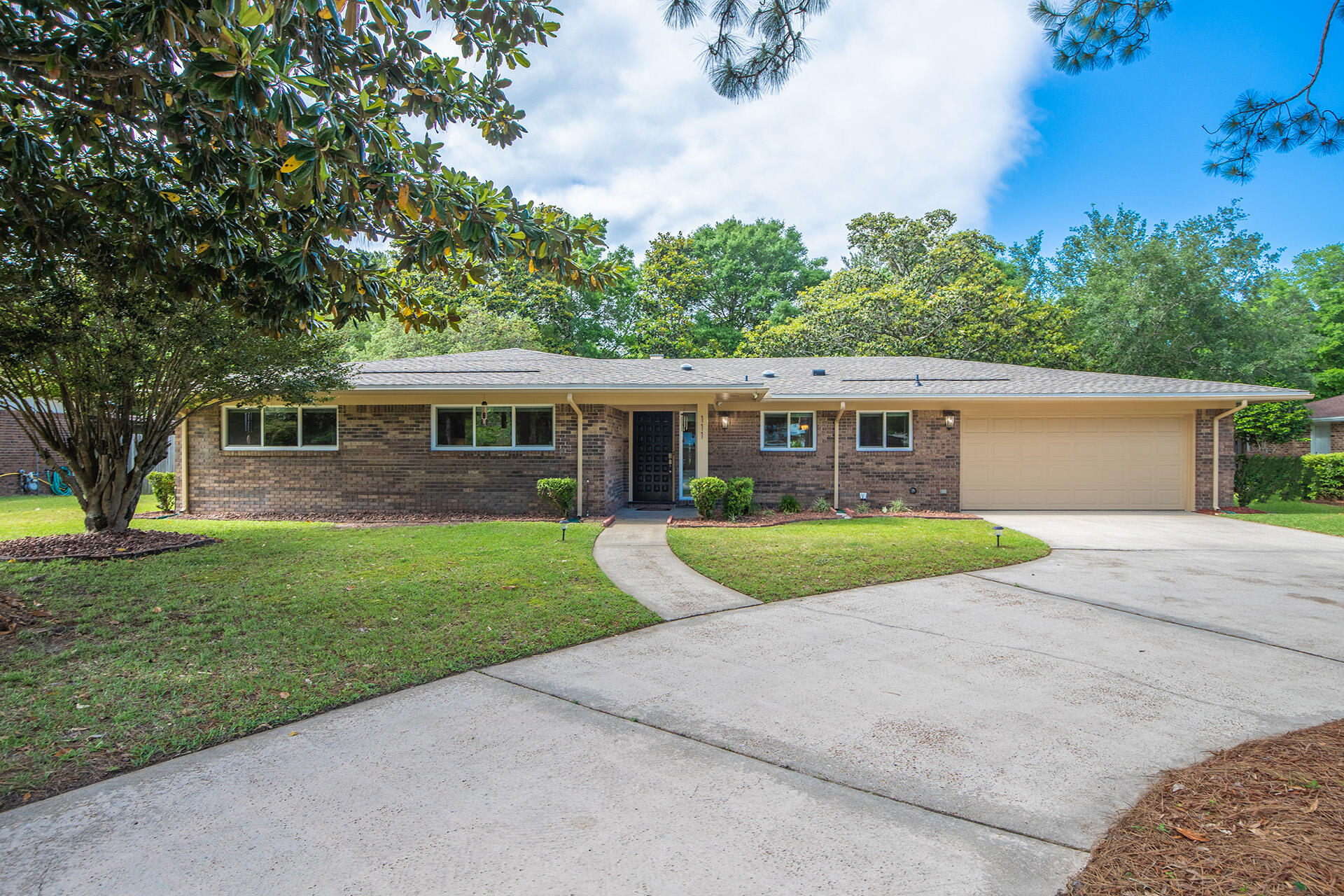 Charming 3 bedroom, 2 bath home located in Lake Lorraine Estates in Shalimar. 
This home has been tastefully updated throughout and ready to welcome a new owner. 
The cozy living room offers a beautiful wood burning fireplace and an abundance of beautiful natural light. 
The updated kitchen features gorgeous GRANITE countertops, STAINLESS STEEL appliance package, white cabinetry, and a large breakfast bar.
Enjoy watching the seasons change from inside the Florida room, which overlooks the fenced backyard.
Spacious bedrooms and modern bathrooms feature updated vanities, travertine tile, and beautiful neutral countertops.
Large laundry room with storage and central vacuum.
This home comes complete with a 2-car attached garage and added workshop. No HOA.
Roof replaced in 2018, along with the installation of impact windows and doors.
This Shalimar gem won't last long- call today to schedule a private showing!