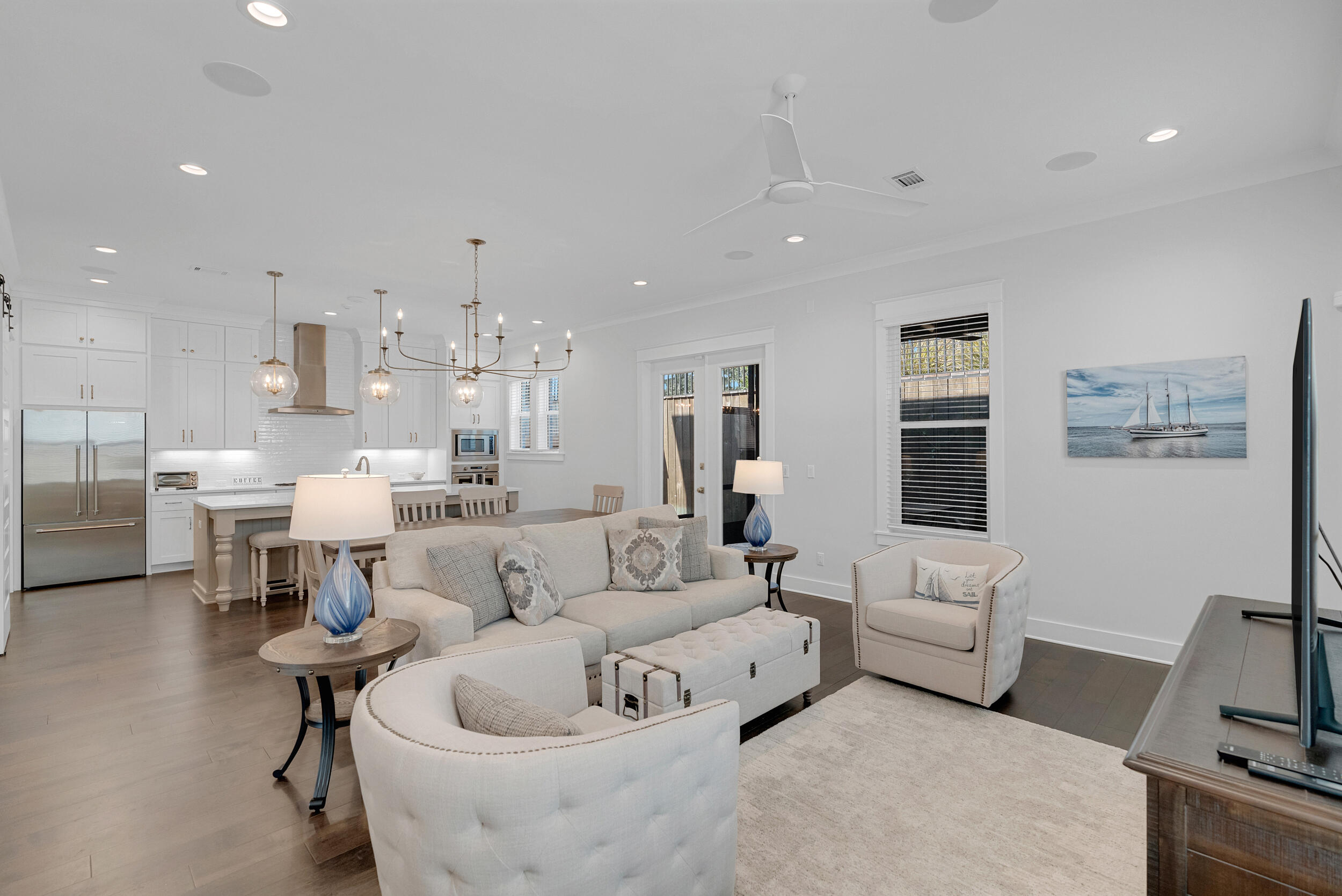 Motivated Seller!  This home would make a great primary home, 2nd home or even investment property- similar homes bring in at least $6k/ month. This is the most private Normandy plan available. Welcome to 68 Ridgewalk Circle, nestled in the distinctive Santa Rosa Beach community of Ridgewalk. This home boasts the best-priced, very popular Normandy floor plan in the neighborhood, providing you with an exceptional living experience. Just a quick ½ mile stroll to Ed Walline beach access - you'll love hearing the roar of the gulf from the private porch on a quiet evening. This well-built all-brick residence, crafted in 2021, offers 3 bedrooms, 2.5 baths, and the best floor plan in the neighborhood. Step inside and you immediately feel welcomed. The heart of the home features an open-concept kitchen, with stainless steel appliances, timeless white shaker cabinets that reach the ceiling, and a generous island that's perfect for gathering with family and friends.
Adjacent to the living room, discover a screened-in porch with an outdoor kitchen, set in a fenced private & quiet backyard, providing ample space to relish the outdoors. Upstairs you'll find 2 ensuite bedrooms -- the large primary suite features a shiplap vaulted ceiling and a bathroom that rivals any high-end spa, including a convenient linen closet and a huge walk-in closet with all the shelving you could possibly need.

This move-in-ready gem includes various upgrades such as Voiceplay surround sound, epoxy-floored 2-car garage, Flo by Moen leak detection system, a wired alarm system with four exterior cameras, an in-wall iPad, wood blinds, and additional shelving in all closets.

Embrace the 30A lifestyle at 68 Ridgewalk Circle, where the main gate ushers you into a close-knit village. Here, neighbors know each other by name, stopping to chat while walking their dogs. Seize the opportunity to transform this wonderful home into your special vacation beach getaway or cherished main residence.