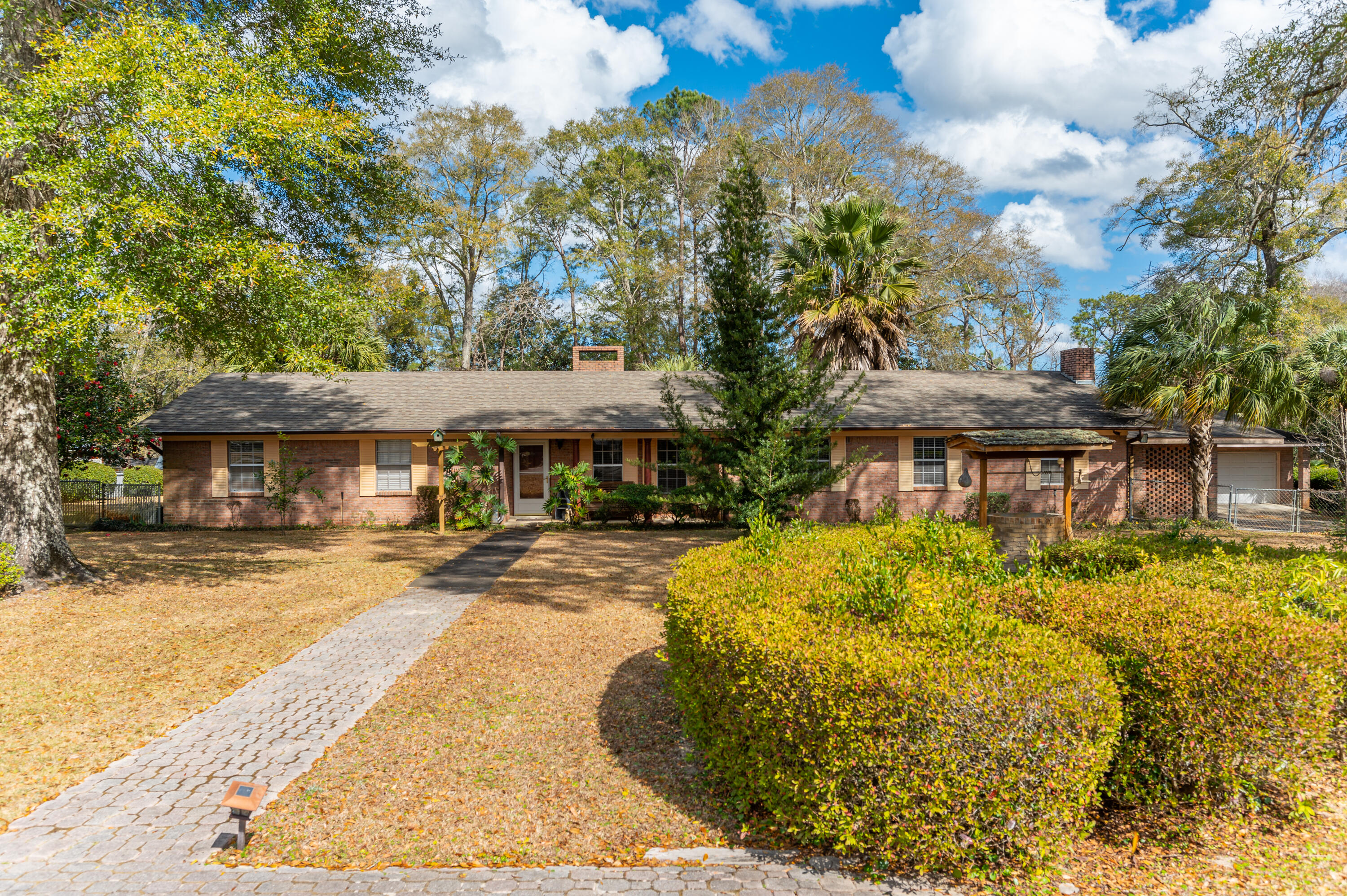Located in Florala Al, this estate property is 2.74 acres with a 2,310 sq ft home with amenities plus adjoining vacant lot with creek. The home is a 3/3 with Lrm, Drm, BKrm, Family rm, game rm, kitchen, laundry. Fireplaces in living room and family room. Stainless appliances and granite kitchen counters. Home was upgraded in 2006. Outside is a salt inground pool with heater,cabana, gazabo, patios with fireplace & grill,
 Koi pond, detached garage, full house generator,  greenhouse, garden area, orchard with fig, grape vines, nectarines, lemon, orange, kumquat, lime, peach, apple, pear, cherry, plum, pomegranate, blueberry and banana. Landscaping includes Palm trees, jasmine, oaks, azeleas and camellias. Please look at pictures to see everything!!!
