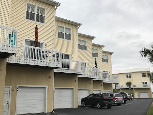 This beautiful 3BR/2BA townhouse sits on the Santa Rosa sound with views all the way to the Navarre bridge. This is a gated community with a pool and lush landscaping that makes it a beautiful place. There are three balconies to enjoy this property from both the back and the front. The layout of this home makes it very convenient for both families and roommate arrangements. The pool is right out your back door and with a ground level covered patio where a grill can be kept, having that summer barbecue will be amazing!
All the bedrooms have their own full bathroom ensuite. The half-bath along with the laundry is conveniently located on the second floor. A washer and dryer is include for your convenience as well. The master bedroom on the top floor overlooks the pool and has double glass doors to a balcony that is serene and quiet. There is one guest bedroom on the third floor and the other on the first. This floor plan offers a lot of privacy and makes it perfect for when family and friends visit! 
The unit has a combination of tile and carpet and the kitchen has beautiful granite countertops, smooth-top stove, double door refrigerator with icemaker and lots of cupboard space  The balcony off the kitchen overlooks the sound and it is the perfect location to sip your morning coffee and enjoy the sound views. On the other end of the second floor off the living room is another larger balcony that can fit a patio set for relaxing in the afternoons. 
There is a one car garage plus assigned parking adjacent the townhouse, guest parking is just around the corner. The sound is great for kayaking fishing, jet-skiing, swimming among many other water activities. This unit is pet friendly with approval and the applicable fees and deposit and your fur babies will love a walk along the sound as much as you will. 
This rental is a must see1 call us today to schedule a showing!