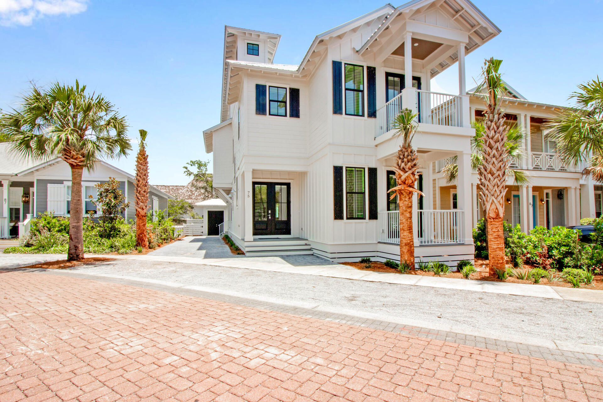 The perfect second home or exceptional vacation rental investment opportunity... new construction, 5 BR, 5.5 BA, open floor plan, multiple gathering areas with a huge gourmet eat-in kitchen/stainless Viking appliances/quartz countertops/large island/butler's station with wine-fridge...three level turn-key home also offers interior design and furnishings by Lovelace Interiors, raised beamed ceilings, a gas fireplace, bedrooms with walk-out balconies, plenty of storage, master suite with separate walk-in shower and soaking tub...outdoor kitchen entertaining area and heated plunge pool... detached storage space for bikes and beach equipment, quality construction upgrades include 16 seer Rheem HVAC units, and hurricane windows... Nestled between the iconic coastal communities of Rosemary Beach and Alys Beach, this home is tucked away from the hustle and bustle of 30A, a short distance to the neighborhood 12,000 sq ft, 378,000-gallon lagoon pool with waterfall and central square, and a tram ride to the deeded beach access.