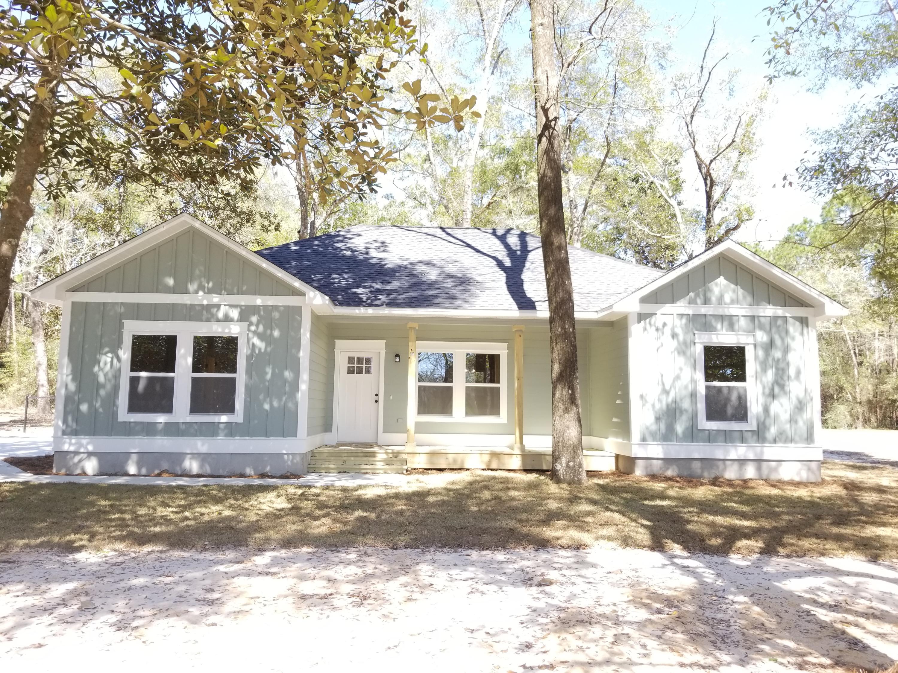 NOW IS YOUR CHANCE TO OWN YOUR YOUR VERY OWN CUSTOM BUILT HOME!! THIS CUSTOM CRAFTSMAN HOME SHOULD BE COMPLETED BY MID JANUARY 2020 AND IS SURE TO BE A HEAD TURNER. JUST A SHORT DISTANCE FROM DEFUNIAK'S FAVORED FISHING IN LAKE JUNIPER YOU'LL ENJOY A BRAND NEW HOME WITH MATURE TREES THAT HAVE BEEN LEFT INTACT FOR YOUR ENJOYMENT. THIS HARD TO FIND CORNER LOT ALLOWS FOR PAVED ROAD FRONTAGE ON 2 SIDE MAKING FOR YOU TO MORE COMPLETELY ACCESS THIS MAGNIFICENT LOT. PLENTY OF ROOM TO BRING YOUR TOYS! THIS SPLIT FLOOR PLAN HOME BOAST 3 SPACIOUS BEDROOMS AND 2 FULL BATH. THE MASTER SUITE HAS IT'S OWN PRIVATE BATH COMPLETE WITH DUEL SINKS AND WALK IN CLOSET, WHILE BEDROOMS 2 & 3 HAVE SOMEWHAT OF A JACK AND JILL SET UP WHILE ALLOWING FOR A COMMON ACCESS TO BATH #2 WITHOUT COMPROMISING THE PRIVACY TO BOTH THE BEDROOMS AND BATH. THE CUSTOM FINISHING AND VAULTED AND BEAMED CEILINGS ARE SURE TO MAKE THIS HOME A HIT. WHETHER YOUR ENTERTAINING, RAISING A FAMILY, OR BUYING YOUR VERY 1ST HOME, CALL TODAY TO SET UP YOUR APPOINTMENT!