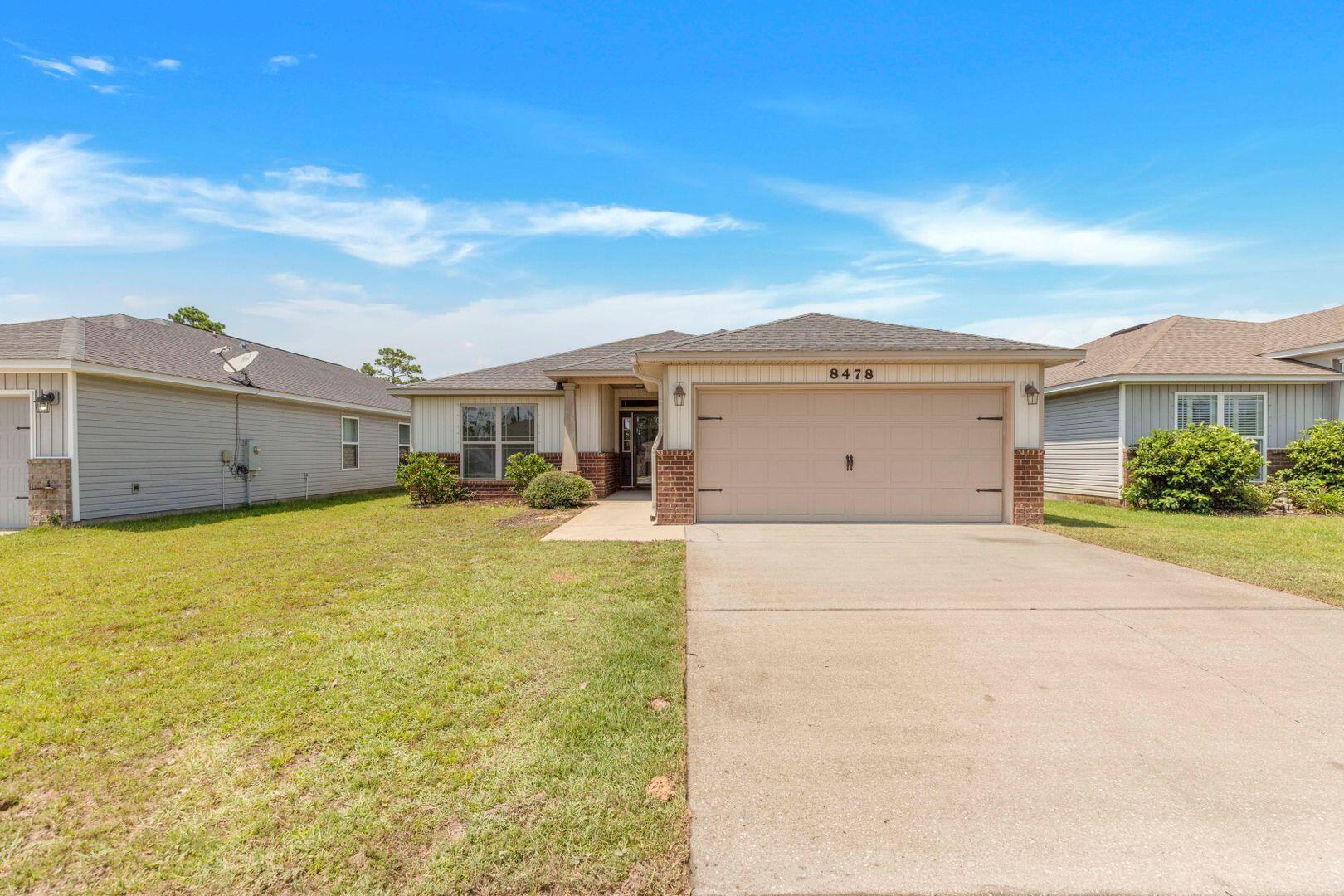 This 4 bedroom 2 bath Navarre home features a split floor plan. The entry way boast a beautifully decorated alcove in the foyer which leads into a spacious living area. The dining room has French doors that lead out to the covered patio and the open kitchen features stainless steel appliances, granite countertops, breakfast bar and center kitchen island with cabinets galore. LVP flooring is throughout the home and carpet in the bedrooms. Master bath has double vanity and a huge walk in closet. NO smoking. 600 minimum FICO credit score required in addition to meeting rental criteria. Pets allowed upon approval with a non-refundable pet fee and with a Petscreening.com report.

All applicants are required to complete an application on PetScreening.com regardless of if they own a pet or not. Applicants with an ESA are also required to complete the application.

We also offer a security deposit waiver option for tenants such that they do not have to pay a security deposit upfront. Terms and conditions apply. Review addenda for details.