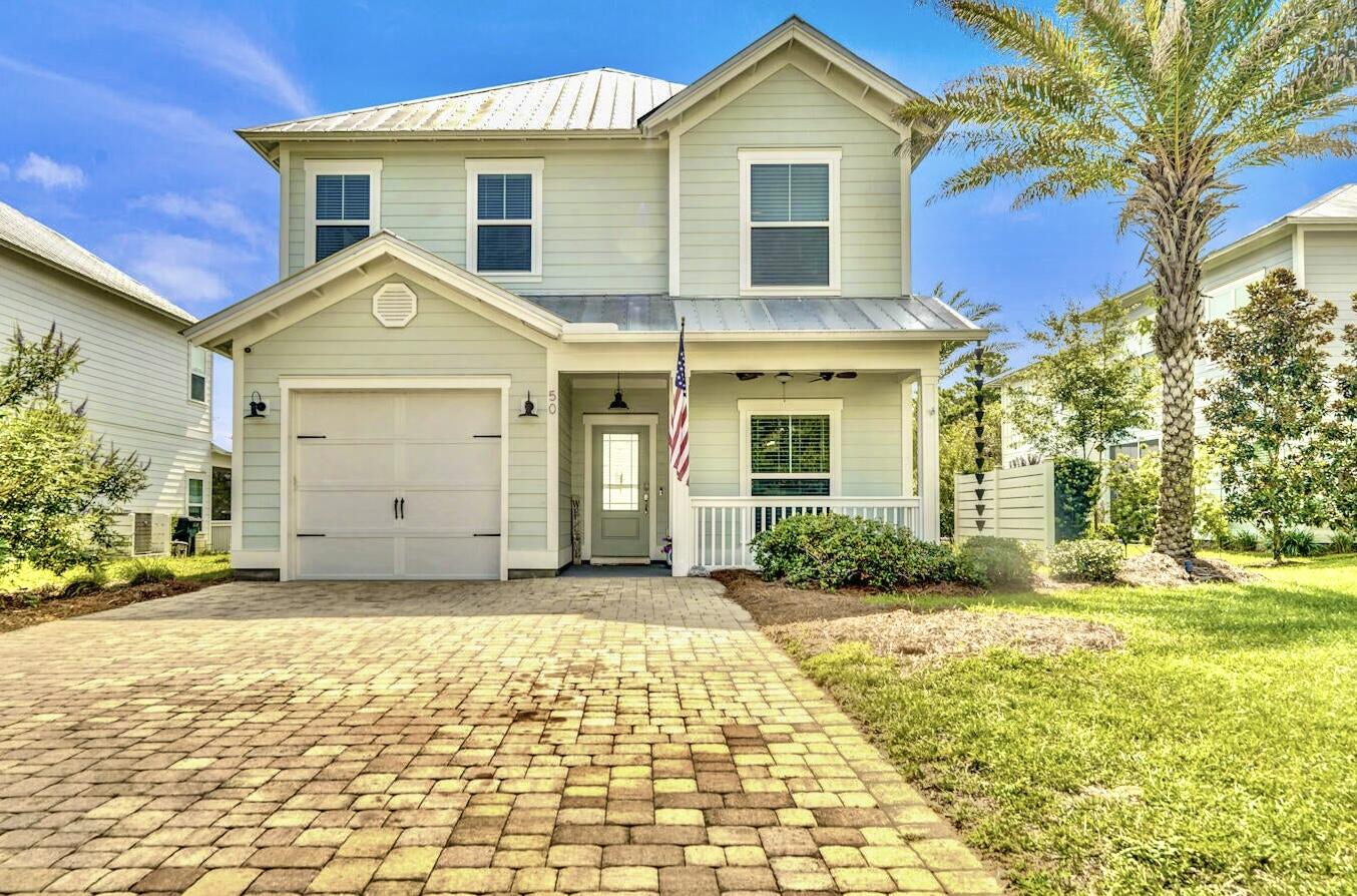 Tucked away on one of the largest and most desirable lots in Grande Pointe, this thoughtfully designed coastal retreat invites you to embrace the laid-back South Walton / 30A lifestyle. With tranquil lake views and a lush backdrop of protected forest within Camp Helen State Park, the setting is both peaceful and private, perfect for morning coffee on the porch or evening sunsets over the water. Just steps from the community clubhouse and resort-style pool, the location could not be more ideal. Plus, ample space for a private backyard pool adds even more potential for outdoor living and entertaining under the Florida sun. Inside, the home offers a relaxed yet refined atmosphere with four spacious bedrooms and three and a half baths, including a sought-after first-floor primary suite. The open-concept living area flows seamlessly into a well-appointed kitchen with a generous island, ideal for gathering after a day at the beach. A formal dining room adds charm and function for hosting friends and family. Upstairs, a large bonus room provides the flexibility to create your ideal media space, home office, or kids' hangout, all just minutes from the sugar-white sands and turquoise waters of 30A.

Seller is offering easy owner financing terms, presenting a unique opportunity for buyers seeking flexible purchase options in one of 30A's most desirable coastal communities.