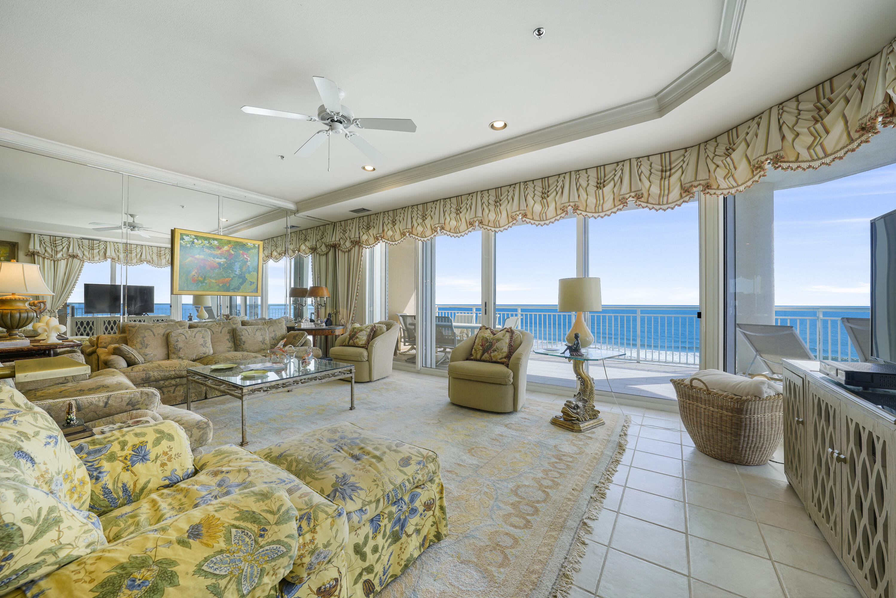 200k PRICE INPROVEMENT  ***AMAZING SUNSET VIEWS***10TH FLOOR WEST CORNER*** LUXURY GULF FRONT CONDO 4 BEDROOM 4 BATH **** RARE OPPORTUNITY ON THE 10TH FLOOR IN THE COVETED 50 STACK OF GRAND VILLAS *** PRIVATE NON-RENTAL BUILDING***STUNNING PANORAMIC VIEWS***EXPANSIVE BALCONY WITH BUILT- IN GAS GRILL*** FULLY FURNISHED***RARELY DO THESE EXQUISITE HIGHLY COVETED, PRIVATE, GRAND VILLAS RESIDENCES COME ON THE MARKET.  CALL ME TO SCHEDULE YOUR PRIVATE SHOWING !) THE GRAND VILLAS BUILDING IS TRULY QUALITY AT IT'S FINEST! GRAND VILLAS IS RENTAL RESTRICTED PROVIDING PRIVACY AND SECURITY WITH A SEPARATE SECURITY GATE, PARKING AND PRIVATE AMENITIES INCLUDING A PRIVATE GULF FRONT POOL AND SPA SURROUNDED BY EXPANSIVE DECKS WITH AN ENTERTAINMENT AREA WITH A WET BAR, FRIG  AND ICE MAKER AND A BEAUTIFUL WALKWAY LEADS DIRECTLY TO THE PRIVATE DEEDED BEACH WITH CHAIR AND UMBRELLA SERVICE.
THIS RENTAL-RESTRICTED COMMUNITY INCLUDES PRIVATE SECURITY AND A FITNESS CENTER. THERE IS ALSO A GRAND VILLAS COMMUNITY ROOM AND LAKESIDE FIREPIT AVAILABLE FOR YOUR SOCIAL EVENTS. NEVER WORRY ABOUT PARKING YOU WILL ENJOY THE PRIVATE COVERED PARKING FOR GRAND VILLAS RESIDENTS ONLY.
THE SPECTACULAR GULF VIEWS ACROSS THE ENTIRE BACK OF THIS 10TH FLOOR CONDO. WELCOME YOU TO THIS LOVELY CONDO. STEP OUT THE DOUBLE SLIDING GLASS DOORS TO THE EXPANSIVE BALCONY WITH YOUR OWN COOKING SPACE INCLUDING A BUILT- IN GAS GRILL, BREAKFAST BAR CONVENIENTLY ACCESSIBLE BY THE KITCHEN WINDOW THAT SLIDES OPEN LIKE A BALCONY DOOR, MAKING IT EASY TO PASS FOOD AND COOKWARE BACK AND FORTH. tHE DOUBLE OVEN , GAS COOK TOP AND DISHWASHER ARE ALL NEW NEVER USED! 
 THE LOCATED IN THE FABULOUS HIDDEN DUNES BEACH AND TENNIS RESORT. HIDDEN DUNES IS KNOWN FOR THE VIEWS... THE RESORT IS FLANKED ON BOTH SIDES BY SINGLE FAMILY HOMES. THERE ARE NO TOWERS TO OBSTRUCT YOUR VIEW ALLOWING FOR INCREDIBLE VIEWS FROM YOUR LIVING ROOM, KITCHEN, AND MASTER SUITE AND BALCONY. YOU WILL SEE THE SUN RISE, THE DOLPHINS PLAYING, THE SUN SETTING, AND THE SEASONAL FIREWORKS SHOW ALL FROM YOUR LARGE PRIVATE BALCONY. THE LOCATION IN THE BUILDING IS IDEALLY SITUATED ON THE 10TH FLOOR IN THE VERY DESIRABLE 50 STACK WHICH IS THE WESTERN CORNER OF THE BUILDING ENSURING FOREVER VIEWS OF THE GULFAND SUNSETS.
THE MAIN LIVING AREAS ALL HAVE BEAUTIFUL TILE FLOORS.
THE LIVING, DINING & KITCHEN AREA FLOW SEAMLESSLY TOGETHER. THE KITCHEN HAS , BEAUTIFUL GRANITE COUNTERTOPS. . THE CONDO WILL CONVEY FULLY FURNISHED BEAUTIFULLY DESIGNED AND FURNISHED BY THE ACCOMPLISHED DESIGNER SANDRA CLEMENTS of  CLEMENTS ANTIQUES & INTERIORS.  
 THE SPLIT FLOOR PLAN IS PERFECT FOR PRIVACY WITH THE MASTER SUITE OFF THE MAIN LIVING AREA.YOU WILL WAKE EACH MORNING IN THE MASTER SUITE THAT BOASTS A WALL OF WINDOWS TO FRAME THE DRAMATIC VIEW OF THE GULF OF MEXICO. CLOSETS GALORE YOU HAVE ONE SPACIOUS WALK-IN CLOSET, ANOTHER DOUBLE CLOSET AND A LINEN CLOSET. THE UPDATED EN-SUITE HAS A RELAXING TUB, WALKIN SHOWER, GRANITE COUNTERTOPS AND DOUBLE VANITIES. ACROSS THE LIVING AREA THERE ARE 3 GUEST BEDROOMS ALL WITH AN EN-SUITE BATH. YOU WILL ALSO ENJOY A SEPARATE LAUNDRY ROOM, AND A SPACIOUS CLOSET IS JUST OUTSIDE YOUR FRONT DOOR FOR ADDITIONAL STORAGE.

HIDDEN DUNES IS A LOW DENSITY, GATED, BEACH FRONT RESORT CONSISTING OF 27 MANICURED ACRES WITH AN ABUNDANCE OF MANICURED MATURE NATURAL VEGETATION, WALKING PATHS, LIGHTED FOUNTAINS AND POOLS. THIS BEACHFRONT DEVELOPMENT OFFERS A PROFESSIONAL TENNIS  ACILITY WITH 6 RUBICO COURTS AND A PRO-SHOP, IN SEASON TRAM SERVICE, LIGHTED BASKETBALL COURT AND PICKLE BALL COURT, HORSESHOE PITS, 4 POOLS, 3 HOT TUBS, BB GRILLS, WORKOUT FACILITY, AND 24 HOUR SECURITY. HIDDEN DUNES OFFERS A PRIVATE BEACH WITH SEASONAL BEACH SERVICE.
CALL ME  TO MAKE YOUR LIFETIME MEMORIES WITH YOUR FAMILY AND FRIENDS ON THE QUIET SUGAR SAND BEACHES OF GRAND VILLAS AT HIDDEN DUNES. BUYER TO VERIFY ALL INFORMATION.