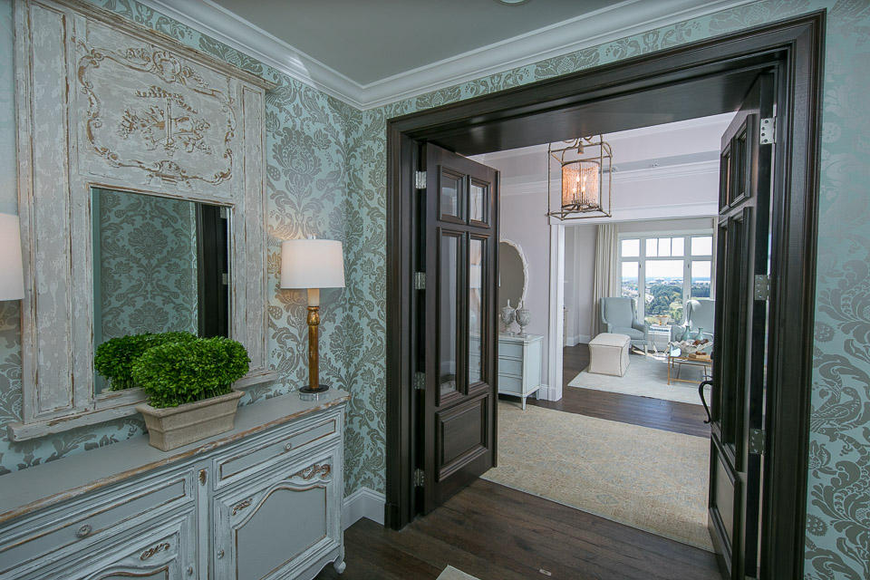 Inspired by beautiful homes gracing the cover of ''COASTAL LIVING'' magazine, the excitement begins the second you enter this custom residence. Remodeled in 2016 with care and pride, applying the finest materials, from the ''African Sapele Mahogany'' front doors of your private entryway, to the imported marble flooring in all three baths and kitchen. The Master Bath has Carrara marble counter tops, and the guest baths have high end granite counter tops. The Gourmet Kitchen with ''WOLF/SUB ZERO'' appliances compliment the the custom cabinetry made to fit around the new appliances with no fillers. Premium ''Buckskin Oak'' hardwood floors take you from the private entryway, into the Den with floor to ceiling built in library/book shelves and an electric fireplace, adding that perfect touch. From the 14th floor of One Water Place, you can see 7 miles to the North across Choctawhatchee Bay and sweeping Gulf views of the Eastern and Southern Coastline, stretching miles. Being on the Easternmost corner of Tower 1, offers incredible sunrises, no matter what time of year. The afternoon sun does not hit the property directly, allowing for maximum comfort during the Summer months as well as a great reduction in utility usage.

The Summer Kitchen, located on the 600 square foot rounded balcony has been completely rebuilt from scratch. The use of Titanium Powder Coating for all the doors, hinges, trim and side panels will help avoid erosion stemming from the elements. Granite Counter tops, New Sink, high end Grill by "Delta Heat" ,Ice maker, and multi use outdoor fridge, frame the outdoor kitchen area, for a true custom look and feel. 

All of the windows throughout the residence have remote controlled window treatments that blend into the trim and offer shade when down. The audio equipment is truly state if the art. The ceilings of the unit were completely redone, to offer not only a clean look, but clean wiring for optimal high speed wi-fi and audio throughout the 3220 square foot condominium.