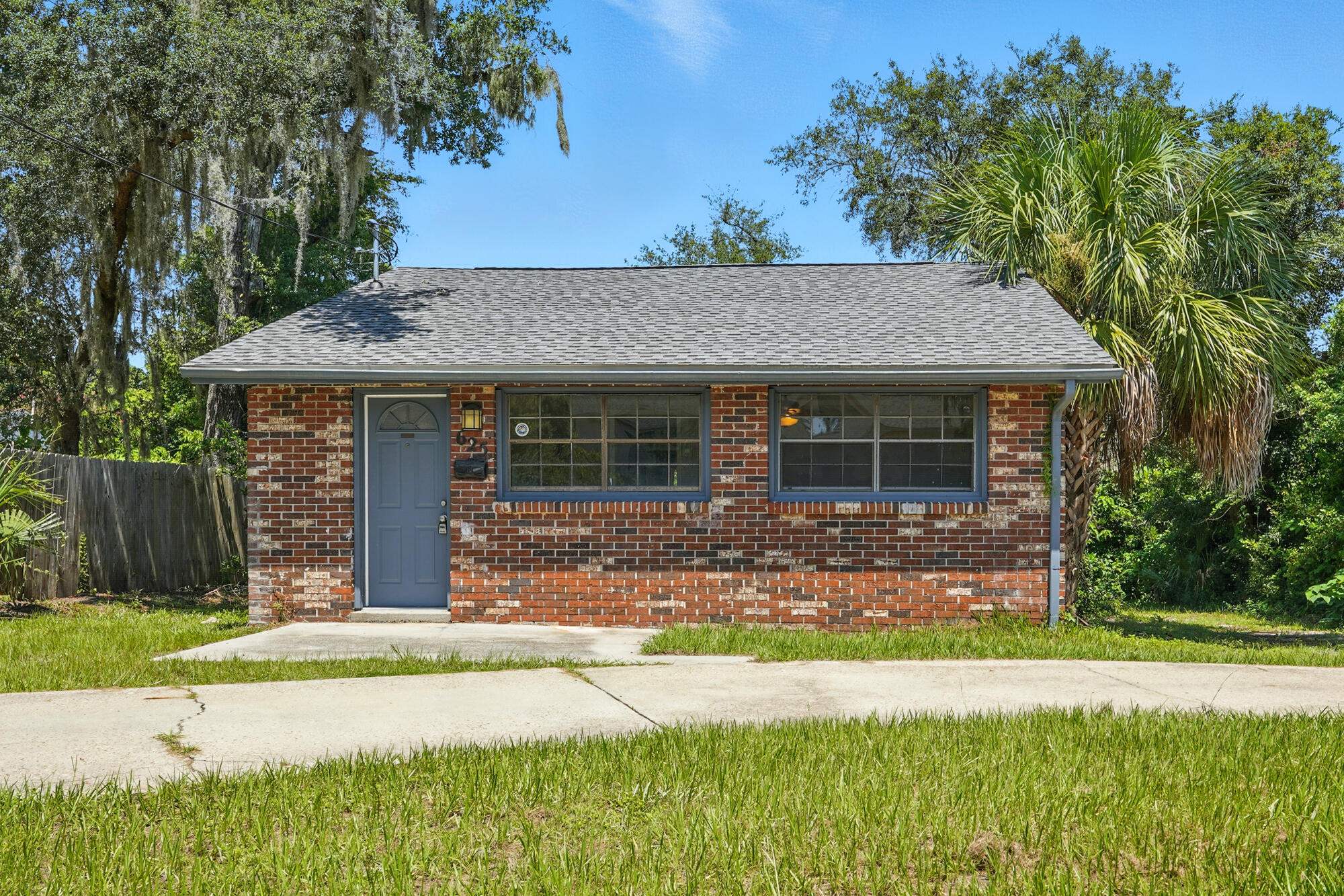 Welcome to this beautifully updated 2-bedroom, 1-bath home in the highly desirable Cove neighborhood of Panama City! Featuring 875 sq. ft. of living space, this charming residence has been thoughtfully rehabbed to blend classic character with modern comfort. Recent upgrades include a brand-new roof (2025), new flooring throughout, a fully renovated kitchen with updated countertops and cabinetry, and modernized bathrooms. Fresh interior paint make the home feel light, bright, and move-in ready. Situated on a 75x150 lot with mature trees, driveway parking, and room to enjoy the outdoors, this home offers both curb appeal and convenience. Located just minutes from downtown, shopping, dining, schools, and waterfront parks, this Cove home is ready for its next owner!