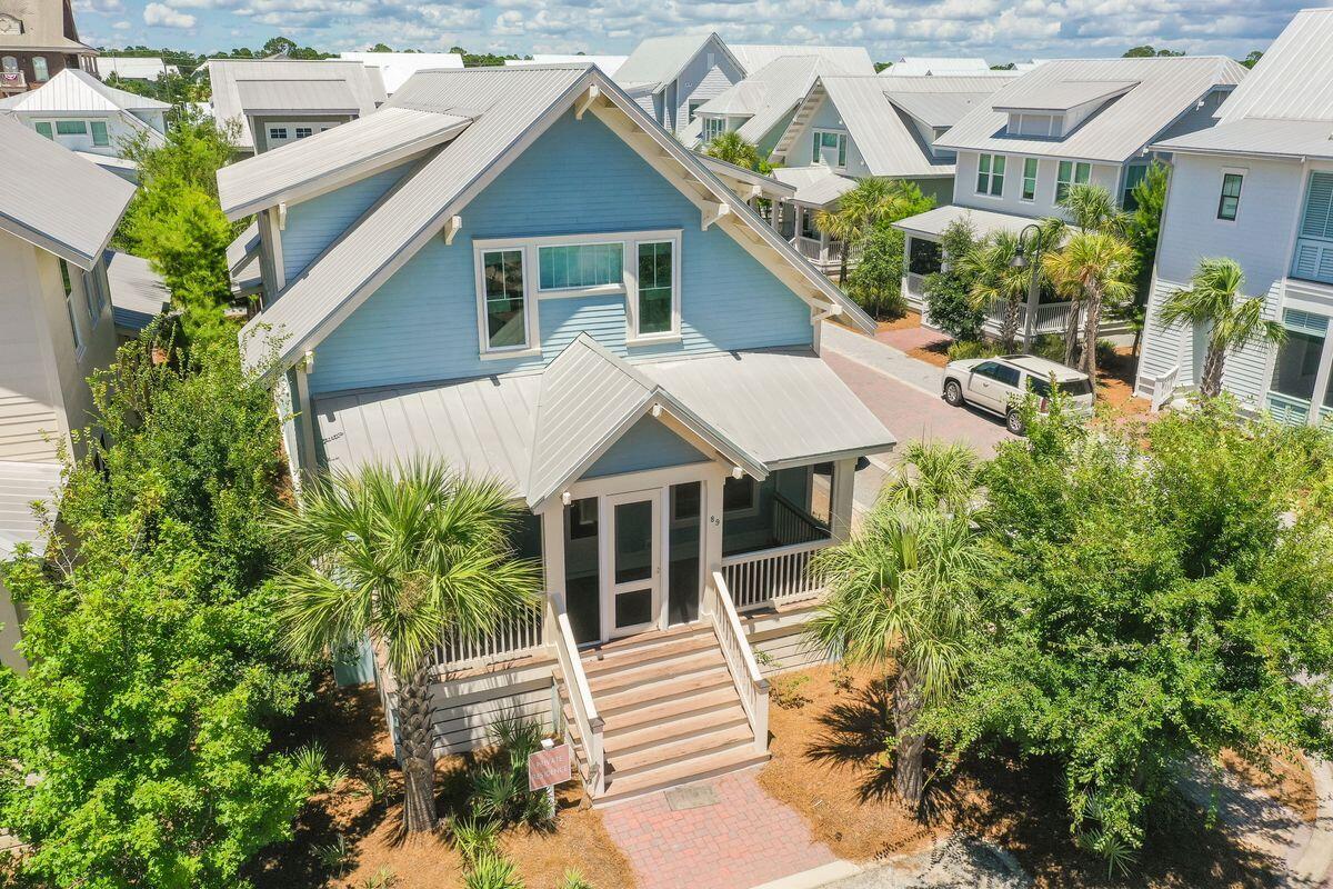 Amazing luxury beach home south of 30A in Prominence. This home has it all: two-car garage, first-floor master suite, two guest bedrooms and two additional bunk rooms for plenty of heads in beds for rental income. Upgrades include: custom wood shelves, quartz countertops, and solid wood kitchen island. The open living, dining and kitchen are ideal for family get togethers and entertaining. Wood flooring runs throughout the living areas of the first floor. Shiplap and wainscoting offer that beachy, upscale feel for 30A. Two screen porches - one on the front of the home and the other on the back will be great for relaxing after a day at the beach. Extra closets and storage offer ample space for everything you'll need. Enjoy easy access to a beautiful Town Center, Resort-style pools, Fitness Center and a seasonal Private Shuttle Service to the beaches of 30A. ''The Hub", the community's town center includes restaurants, shops, and an amphitheater with a covered event pavilion, a cinema screen for movies as well as a stage for concerts and events, all within walking distance. All room dimensions and square footage are approximate and should be verified by the buyer.