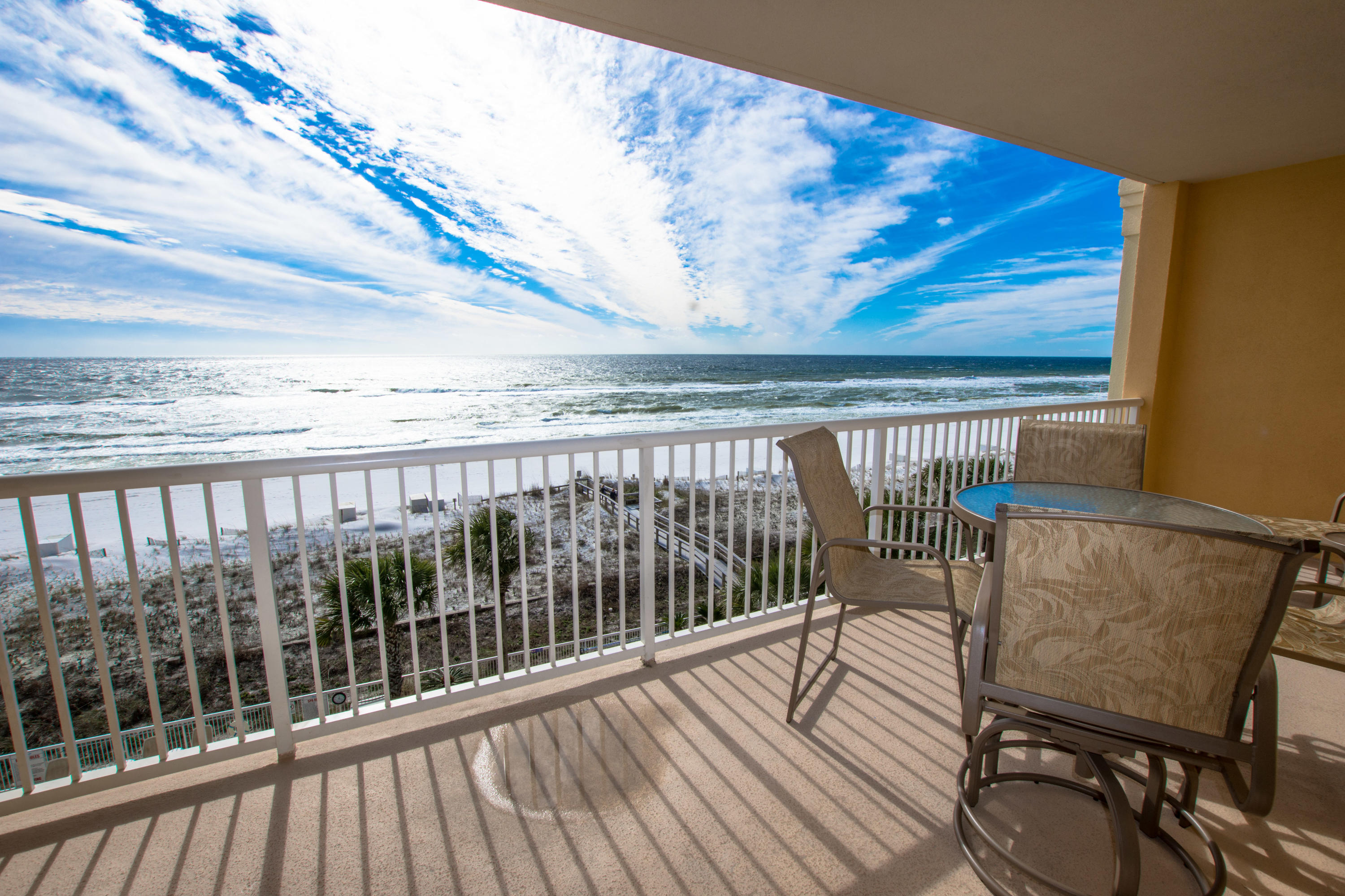 Azure is the crown jewel of Okaloosa Island and this stunning 3 bedroom, 3 bath condo at Azure is one of the reasons why! Upgrades include tile floors throughout main living areas, stainless steel appliances, granite counters in kitchen and baths, beautiful furnishings and a large Gulf front balcony to soak in all the views. The Master Suite is Gulf front and has balcony access plus a spa-like bath with soaking tub, separate shower and his/her closets. Situated in a prime location in the building for all the best views. This is a rental income producer! Imagine one of the area's most luxurious condominium complexes with every amenity desired including 2 pools, 2 hot tubs, a spray park, fitness center, gated garage parking and a large boardwalk to access the beautiful beach. This is a turn-key property - all you need is your bathing suit!