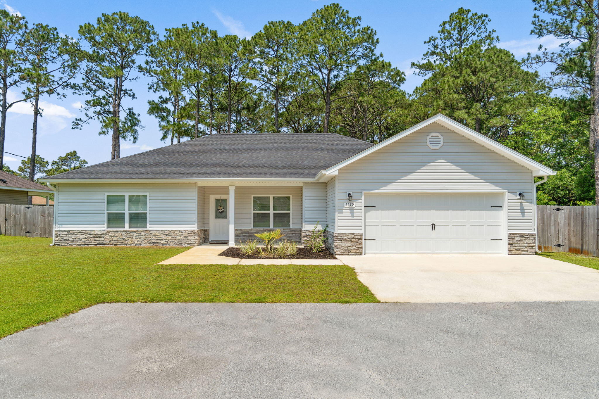Open House Sat 5/21 10am - 2pm.
Welcome home! This lovely home, located at the end of the street, has an open, split bedroom floor plan with wood-look ceramic tile planks throughout. The kitchen boasts soft-close drawers, large walk-in pantry, glass top stove & island. The open dining area makes a perfect spot to enjoy any mealtime. The expansive primary bedroom offers private outdoor access.  The en-suite bathroom features a double vanity & walk-in closet. Two guest bedrooms are also amply-sized and the guest bathroom features a double vanity as well. The spacious, secluded and fenced back yard includes a large covered patio.  It is only minutes from white sandy beaches, schools, shopping, dining, military bases & health care facilities.