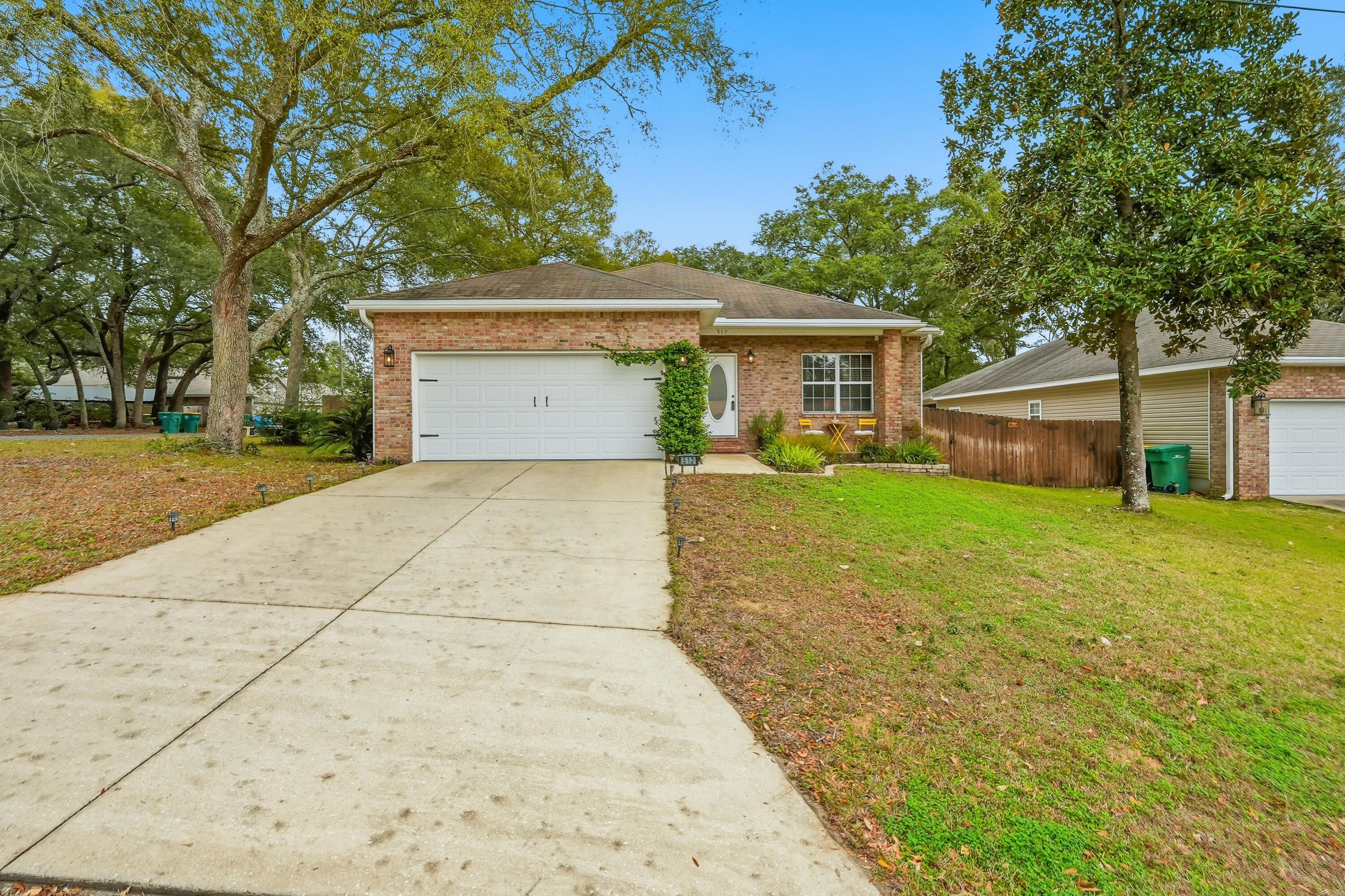 A new roof and hot water heater will be installed prior to closing with an acceptable offer.

Tucked away on a peaceful street, this move in ready home sits on a spacious corner lot and offers both comfort and functionality. Step inside to a welcoming entry that opens to a generous living area with vaulted ceilings, creating a bright and open feel.
The dining space connects effortlessly to the kitchen, featuring granite countertops, stainless steel appliances, a breakfast bar, and ample cabinetry, ideal for both everyday living and hosting guests. The thoughtfully designed split-bedroom floor plan provides privacy for the primary suite, which is separated from the guest rooms. Enjoy outdoor living year-round in the backyard oasis, complete with an 8-foot privacy fence and screened patio. Located just minutes from local parks, scenic wooded trails, stunning beaches, and Eglin AFB, Hurlburt Field, and Duke Field, this home delivers convenience, space, and peace of mind in a prime location.