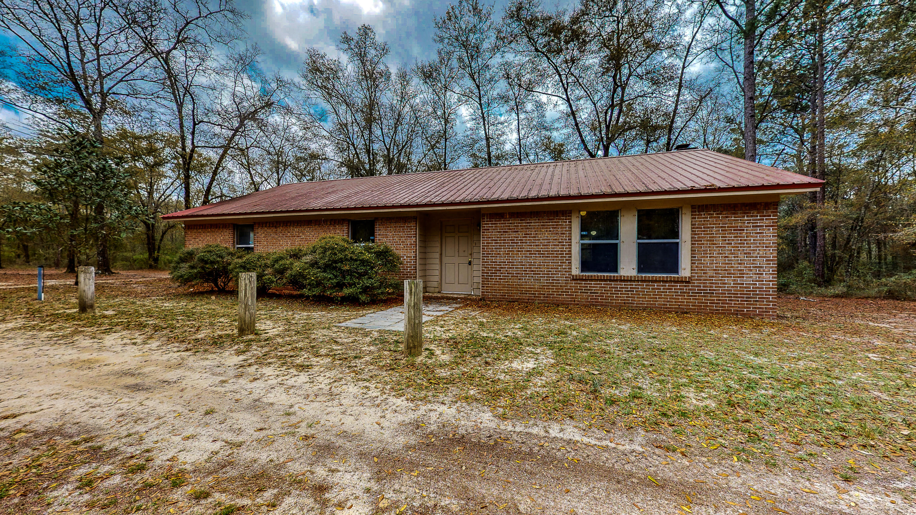 Great opportunity! Three bedroom, two bathroom, one story brick home on almost four acres! This home is very spacious with over 1800 square feet and featuring two living spaces and an eat-in kitchen! There is a master bedroom with en-suite bathroom and two additional bedrooms and full additional bathroom, This property is accessed by a long driveway and feels completely secluded and private! Background check , credit check, employment verification and references will be required! Pets are allowed upon approval and with non-refundable pet fee! Requirements are household income is $4,250, employment must be one year consistently unless you are moving here for employment, and a credit score minimum of 600.