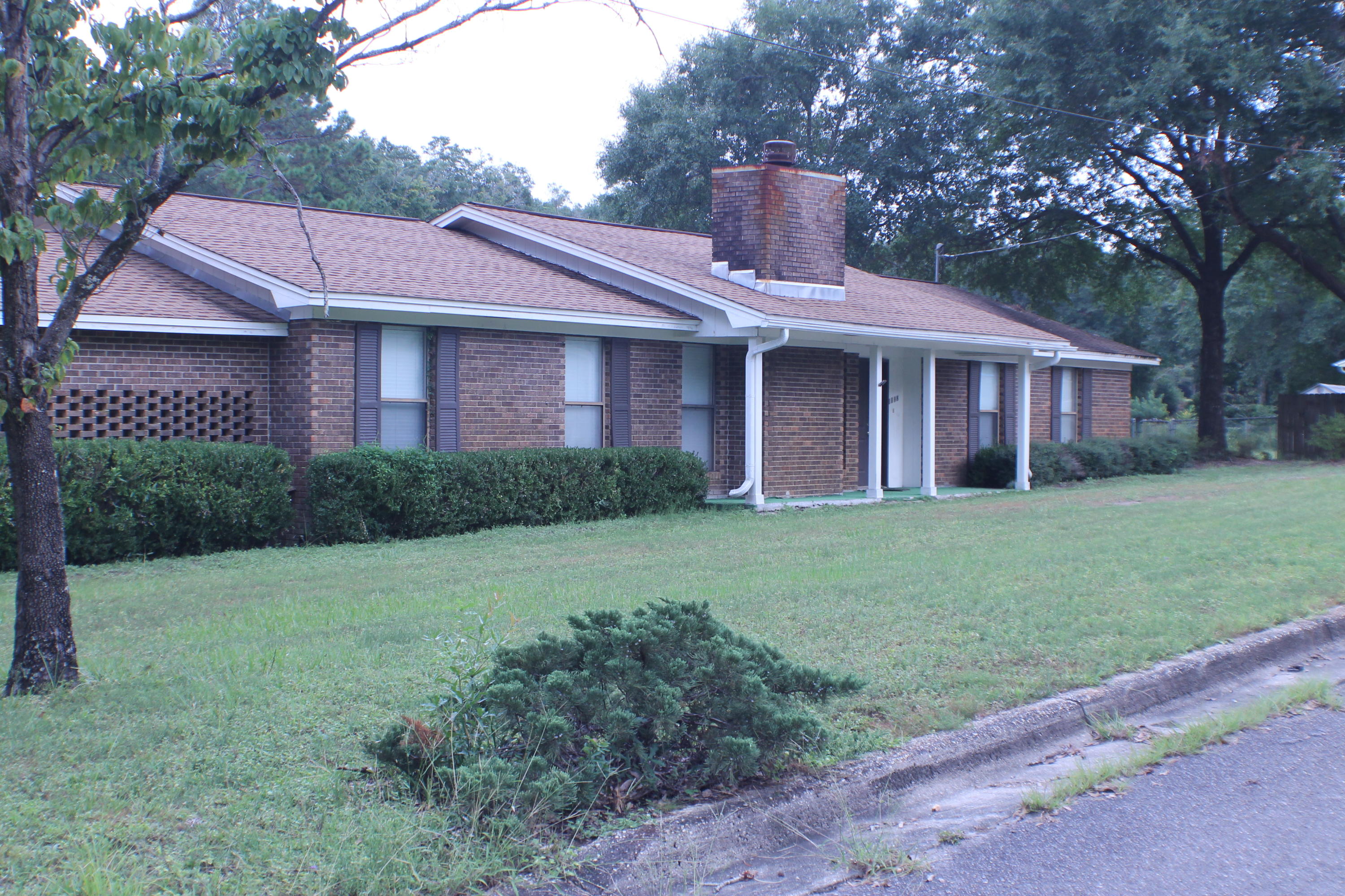 Large ranch style home for a large family! 3 bedrooms 2 bath with a bonus room that can be used as a 4th bedroom, game room, guest room, or additional family room! Large pantry room or storage space, along with a utility room, and laundry room! This house also has a sunroom for having your morning coffee overlooking the big back yard with a little stream that is approximately 1.5 Acres. 2 car carport and shed as well!!! Come see this one today!! Call Paige for showing appointment.
