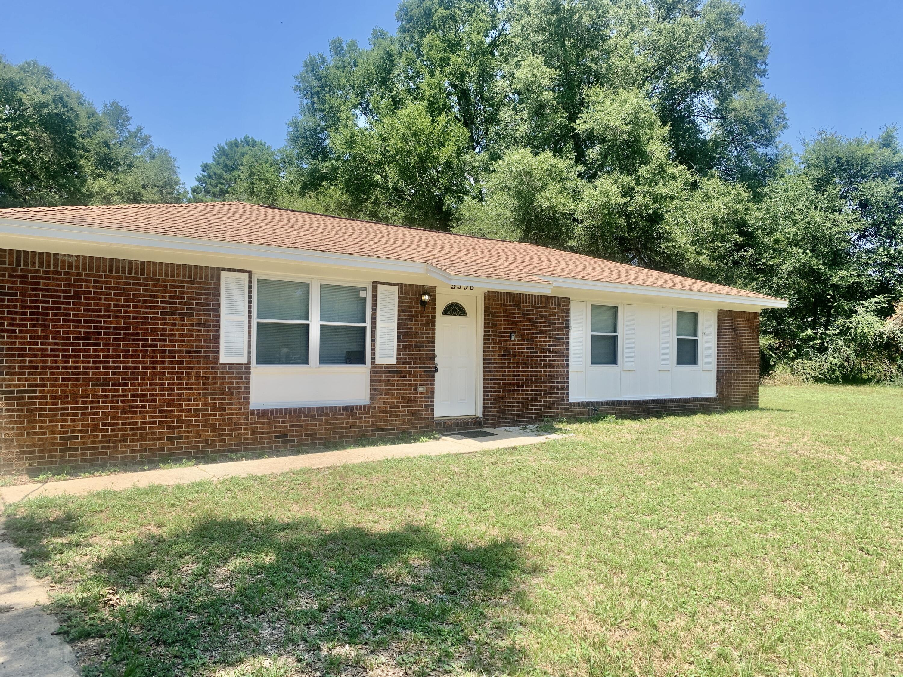 REO.  WHAT MORE COULD YOU ASK FOR!  ALL BRICK HOME SITTING ON A LARGE .70 ACRE LOT WITH FENCED BACK YARD!  SPACIOUS KITCHEN WITH PLENTY OF CABINETS AND COUNTER SPACE.  CENTRAL AIR AND HEAT REPLACED IN 2019, BRAND NEW SEPTIC SYSTEM, LARGE UTILITY SHED, 2 CAR CARPORT AND PLENTY OF SHADE TREES! NOT IN CITY LIMITS SO LOWER TAXES!  ONLY 3 MILES TO DOWNTOWN CRESTVIEW.  CALL TO MAKE APPOINTMENT TO SEE THIS HOME NOW!