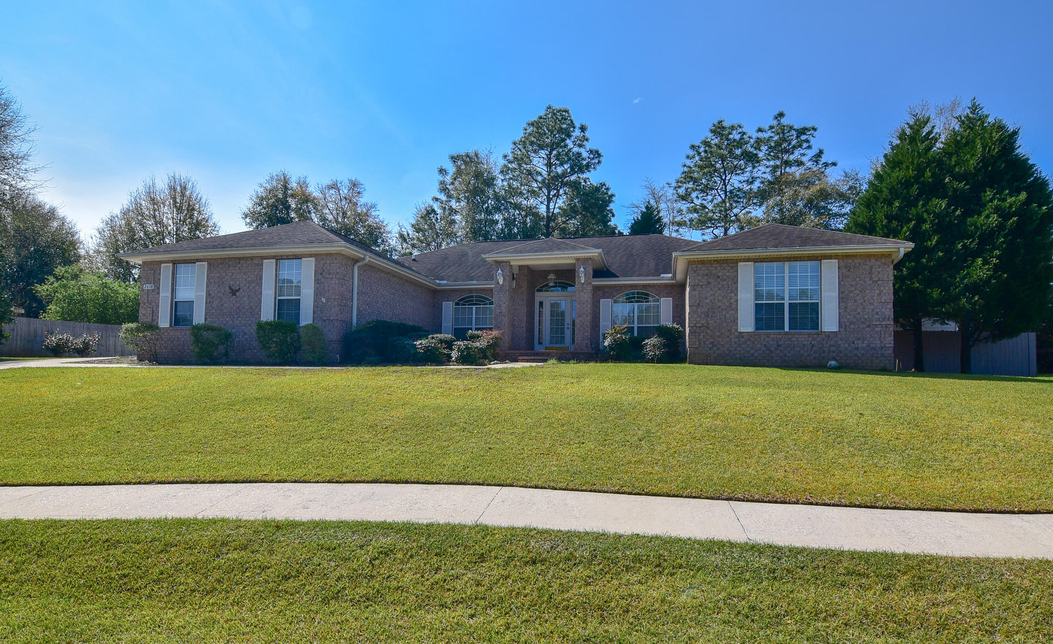 This spacious home in Silver Oaks is ready and waiting for you. With four bedrooms plus an office everyone is afforded the privacy they deserve. The family room has a vaulted ceiling, fireplace with gas log (can also be wood burning) and french doors leading to the screened porch. This backyard oasis has a berm with beautiful plantings including colorful azaleas. Your large eat-in kitchen also overlooks this area and features lots of cabinets, extra canned lighting, walk-in pantry, breakfast bar and easy access to both the dining room and the laundry room which also has a sink. The family room, office, dining room and entry have engineered wood flooring and crown molding. A large master bedroom is dressed with crown molding as well, accommodates over sized furniture and leads to the master bath which includes double sinks, whirlpool tub, separate shower and two walk-in closets.  The home has a fully fenced yard with two gates (one is a double gate), sprinkler system, and 12 x 16 storage shed that has electricity, windows and a double door with ramp for easy access.  It's the perfect place to store your riding lawn mower or have your own workshop! A 13 SEER AC unit was installed in 2014.