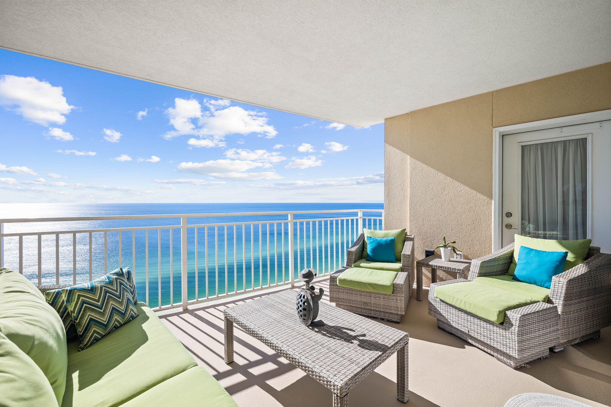 This exquisite Gulf front condo ''Be Our Guest, PCB!'' is luxuriously appointed and exceptionally renovated, offering breathtaking views overlooking one of the world's most beautiful beaches, the Emerald Coast. Located on the 22nd floor, high-speed elevators whisk you directly to your door, elevating your sense of luxury. With a proven rental history and established clientele, this turnkey property is an exceptional investment opportunity - grossing $57K in 2023 and $58K in 2024. The condo comfortably sleeps 8 guests, making it ideal for both personal use and as a vacation rental.  Step inside to discover a sleek, modern interior with luxury vinyl plank flooring throughout.  The open concept living and dining areas are perfect for both relaxation and entertainment. The gourmet kitchen is a chef's dream, featuring stunning granite countertops, a mother-of-pearl fish scale backsplash, and stainless-steel appliances, all set against a backdrop of expansive beach views. The two-bedroom, two-bathroom layout includes a spacious primary suite which offers a peaceful escape, with a charming seating area by the bay window, perfect for enjoying serene mornings with a cup of coffee and breathtaking views. The luxurious primary ensuite, which is equally impressive, features an updated glass-enclosed walk-in shower, corner soaking tub, dual vanity, walk in closet and access to the Gulf front balcony.  
Emerald Beach Resort provides everything you need for a luxurious vacation.  Enjoy direct beach access, two pools (one seasonally heated), two hot tubs, tiki bar, and a second north pool area with shuffleboard. The resort also features a fitness center, game rooms, grilling areas, a gift shop, and even a Starbucks onsite at the resort.  For evening entertainment, head to the Sky Bar for cocktails with a view or enjoy ice cream and pizza nearby. It has all the amenities you expect from a first-class vacation destination. The gated, covered parking garage and 24-hour security offer peace of mind, making this condo the ideal vacation or investment property.  Sold fully furnished and turnkey-ready, it's ready for immediate enjoyment or rental. Whether you're looking for a primary residence, second home, or investment opportunity, inquire today to learn more about this exceptional opportunity.