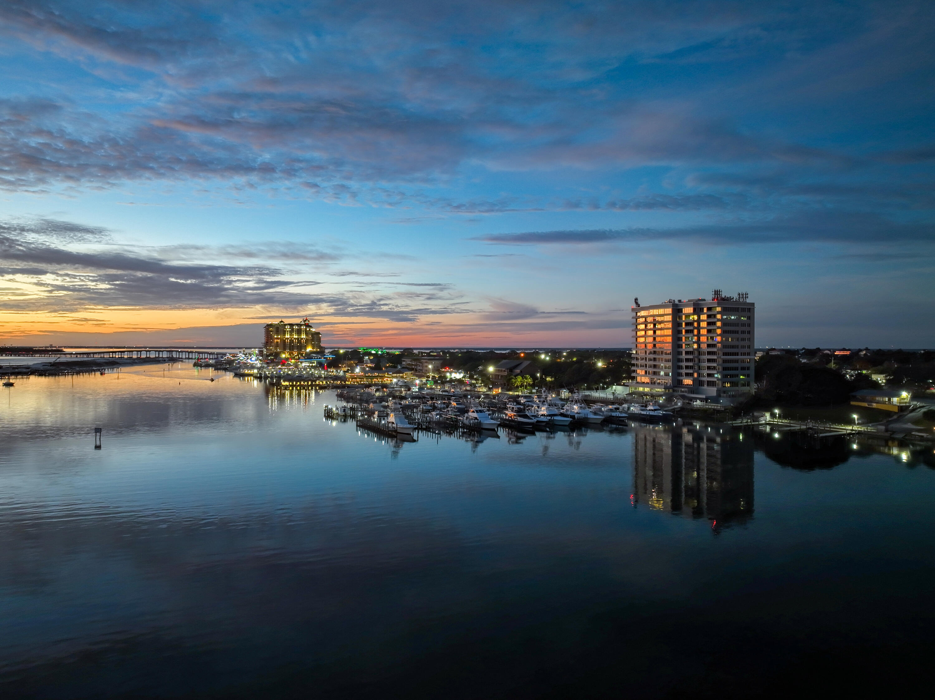 Spectacular Views and Boat Slips!  Renovated 9th floor 3 bedroom 3 bath corner unit at The Destin Yacht Club. This unit comes with 2 Boat Slips  #30, & #46 One inside 20' x 55' and One outside 80' x 20'. Also includes one of the larger Storage areas under the building. The Destin Yacht Club is gated and very secure. DYC has phenomenal common areas, pool and workout facilities. The Destin Yacht Club has all new windows & doors. The balconies were resurfaced, and the building also has a new roof.