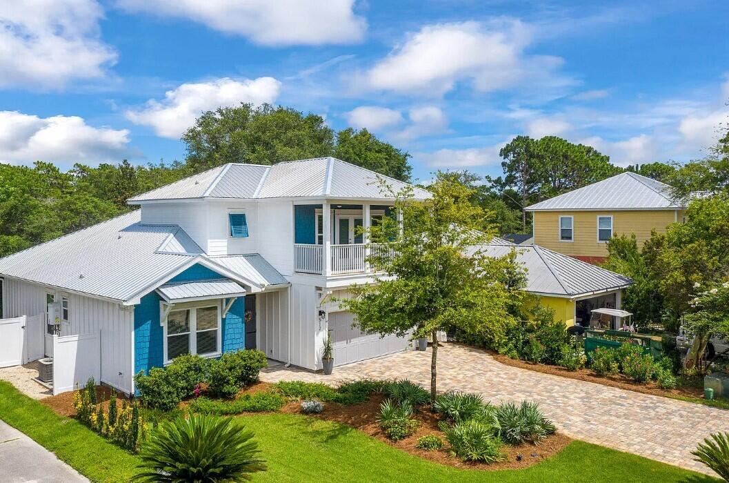 Welcome to paradise! Stunning cottage style home located on a quiet cul de sac at desirable 30A. Walking distance to Alys Beach! The community features a deeded beach access with golf cart parking and gated entry. This one-of-a-kind home sits on a large lot and boasts 2,049 square feet of living space. Upon entering the large double front doors you will find TWO ground floor bedrooms, including a ground floor master suite complete with a double vanity, free standing soaker tub, walk-in shower, and walk-in closet with built-in stackable washer and dryer. Open great room with recessed lighting and tall ceilings. dry bar with icemaker and wine cooler, oversized island, gas range, walk-in pantry, and custom cabinetry are just some of the many features you will find inside this beautiful home. Half bath located downstairs. From the living room double French doors you will find a large screened in patio overlooking a stunning saltwater gunite pool with tanning deck. Spacious fenced in back yard. Upstairs you will find two full bedrooms, one full bath, and ample storage space. Large balcony from the front upstairs bedroom overlooks a custom paver driveway. Two car garage with additional storage. This property is being sold completely furnished! All appliances, furniture, and window coverings convey. 6 seater golf cart is also included in the sale. Come take a look at this amazing home today!