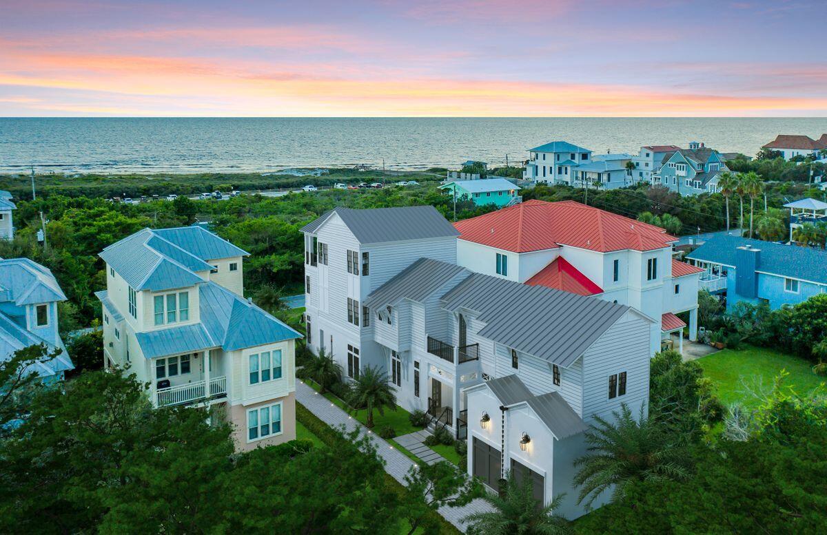 Primely located in the emerging neighborhood of Pompano Place in the heart of Inlet Beach, this exceptional turn key property offers beautiful gulf views & exceptional architectural styling with an impressive three story vertical footprint and well amenitized including a private pool, spacious two car garage and steps away from exceptional beach access. This prominent new construction by BetterBuilt of Northwest Florida has been thoughtfully curated to maximize space and embrace an open living floor plan yielding 4,038 sqft of heated living space including five well appointed bedroom suites including a kid's bunk room. The first floor is accentuated by a generously sized living room, chef's kitchen and adjoining dining room featuring premium finishes including pecky cypress ceilings, beautiful custom cabinetry and Thermador stainless appliances in the kitchen as well as ample windows allowing for an abundance of natural lighting. The first level living also offers direct access to the private pool area and surrounding pool deck as well as a first level suite with ensuite bath. The second floor hosts a large primary suite complete with a spa-like ensuite bathroom as well as a laundry room, secondary living room and two additional bedroom suites & bunk room. The third level is a full floor entertaining space, including a billiards room, adjacent home theatre and covered deck with outdoor kitchen & spectacular views facing south over Inlet Beach. This pristine property is currently under construction with a mid 2022 completion target. This prime location offers excellent proximity to Rosemary Beach, as well as the east end of 30A and Northwest Florida Beaches International Airport.