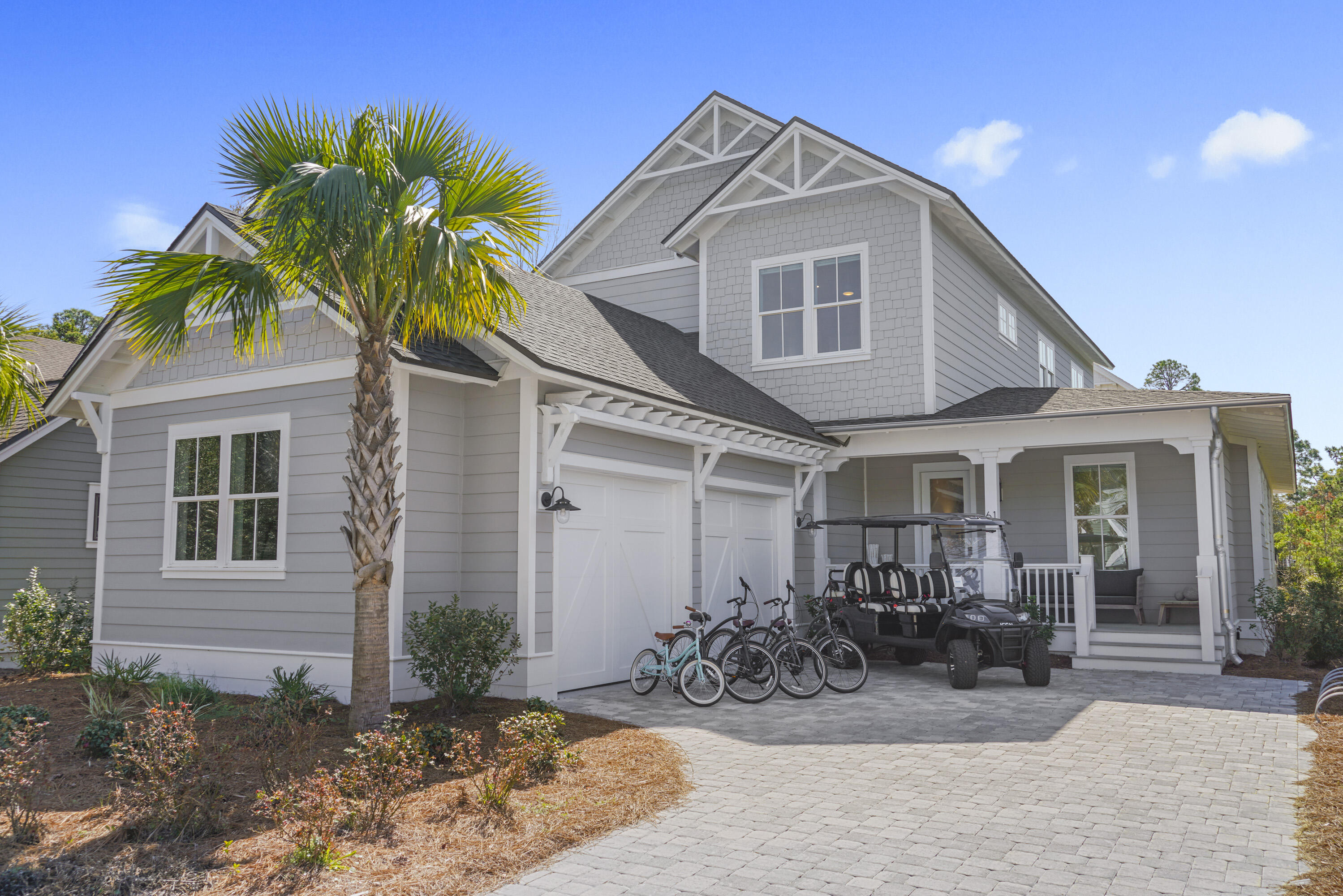WELCOME TO OUT OF THE OFFICE 30A AT 61 SHEEPSHANK LANE, WATERSOUND WEST BEACH - A COASTAL HAVEN ON 30A. DISCOVER THE ALLURE OF COASTAL LIVING AT ITS FINEST WITH 61 SHEEPSHANK LANE, NESTLED IN THE HEART OF THE EXCLUSIVE GATED COMMUNITY OF WATERSOUND WEST BEACH, REVERED AS THE BEST-KEPT SECRET ALONG SCENIC HIGHWAY 30A. THIS MAGNIFICENT HOME BUILT IN 2022  BY BETTERBUILT OF NW FLORIDA IS NOT JUST A HOME; IT'S AN ENTRY INTO A LIFESTYLE ENRICHED WITH THE NATURAL BEAUTY AND SERENITY OF FLORIDA'S EMERALD COAST.   IN THIS EXCLUSIVE GATED COMMUNITY YOU WILL ENJOY THE PRIVACY AND SECURITY OF LIVING IN A SOUGHT-AFTER ENCLAVE KNOWN FOR ITS SERENE SETTING AND COMMUNITY SPIRIT. UNPARALLELED LOCATION: BACKING ONTO THE STATE PARK, THIS HOME OFFERS A PEACEFUL RETREAT SURROUNDED BY NATURE'S BEAUTY, WITH A UNIQUE AND PRIVATE PATHWAY LEADING TO THE SUGAR-WHITE SANDS AND EMERALD WATERS OF 30A'S COASTAL BEACHES. LUXURIOUS LIVING SPACE  SPANNING NEARLY 3,000 SQ FT, THIS 4BR/4BA  HAS  AN ADDITIONAL BONUS ROOM ON THE MAIN LEVEL THAT MAY BE USED AS A STUDY OR ADDITIONAL BUNK ROOM. THIS COASTAL COTTAGE BOASTS METICULOUS DESIGN AND CRAFTSMANSHIP; WHITE OAK HARDWOOD FLOORS, SHIPLAP ACCENT WALLS, AND A COZY FIREPLACE SET THE STAGE FOR A WARM AND INVITING AMBIANCE. DESIGNER FURNISHED WITH SOOTHING COASTAL HUES AND BEAUTIFUL FURNISHINGS THIS HOME WILL CONVEY FULLY FURNISHED AND RENTAL READY.  HIGHLIGHTS OF THE KITCHEN INCLUDE PROFESSIONAL GRADE THERMADOR APPLIANCES, SHAKER-STYLE WOOD PAINTED CABINETRY, CALCUTTA VICENZA QUARTZ COUNTERTOPS INCLUDING A CENTER ISLAND, A TILED BACKSPLASH, AND A FARMHOUSE SINK. The MASTER SUITE IS AN OASIS WITH A  SPA-LIKE BATH, A 71" FREESTANDING SOAKER TUB, WALK-IN SHOWER, AND CUSTOM CLOSET, PLUS DIRECT ACCESS TO THE COVERED BACK PORCH, MAKE THE MASTER SUITE A TRANQUIL ESCAPE. ENTERTAINMENT AND COMFORT: THE SECOND LEVEL FEATURES A COMMON LOUNGING AREA WITH BUILT-IN SHELVES, A BEVERAGE BAR, SINK AND A CHARGING STATION, ALONGSIDE TWO GUEST SUITES AND AN ADDITIONAL SUITE WITH A PRIVATE BATH. THE OUTDOOR LIVING SPACE INCLUDES A LARGE COVERED BACK PORCH WITH A SUMMER KITCHEN, DINING AND LOUNGING SPACE. THE TWO-CAR GARAGE, INCLUDING A 6-SEATER GOLF CART AND BIKES (THAT CONVEY WITH THE PROPERTY), UNDERSCORES THE HOME'S READINESS FOR BEACH LIFE AND OUTDOOR ENJOYMENT. THE COMMUNITY AMENITIES INCLUDE 
PRIVATE DEEDED BEACH ACCESS. A SHORT, SCENIC 5-MINUTE WALK LEADS YOU TO A PRIVATE BEACH WALKOVER, ENSURING YOUR DAYS ARE FILLED WITH SUN, SAND, AND SURF WITHOUT THE CROWDS.
THE RESORT-STYLE POOL AND CLUBHOUS INCLUDES  A STUNNING POOL, OUTDOOR GRILL, AND FIREPLACE THAT PROVIDE THE PERFECT BACKDROP FOR RELAXATION AND SOCIAL GATHERINGS. ENJOY YOUR ACTIVE LIFESTYLE WITH BOARDWALKS, NATURE TRAILS, AND ACCESS TO THE WATERSOUND BEACH FITNESS CENTER, STAYING ACTIVE AND CONNECTED TO THE NATURAL ENVIRONMENT IS EFFORTLESS. A SERENE COASTAL RETREAT: WHETHER SEEKING A VACATION RENTAL INVESTMENT, A FULL-TIME RESIDENCE, OR A PRIVATE GULF-SIDE RETREAT, 61 SHEEPSHANK LANE OFFERS AN UNMATCHED BLEND OF LUXURY, COMFORT, AND ACCESSIBILITY TO THE BEST OF 30A'S COASTAL LIFESTYLE. BEYOND THE GATES, THIS COMMUNITY STANDS AS A TESTAMENT TO CLASSIC MARITIME INFLUENCES, WHERE HOMES ARE SHELTERED BY TOWERING PINES AND DESIGNED WITH AN EYE FOR DETAIL AND A HEART FOR THE RHYTHMS OF BEACH LIFE. TO EXPERIENCE 61 SHEEPSHANK LANE CONTACT US TO SCHEDULE A VIEWING AND TAKE THE FIRST STEP TOWARDS LIVING YOUR DREAM AT WATERSOUND WEST BEACH, WHERE EXCLUSIVITY MEETS THE WARM EMBRACE OF THE GULF COAST. LIVE THE BEACH LIFE, FREE FROM CROWDS, WITH ALL THE AMENITIES AT YOUR DOORSTEP.