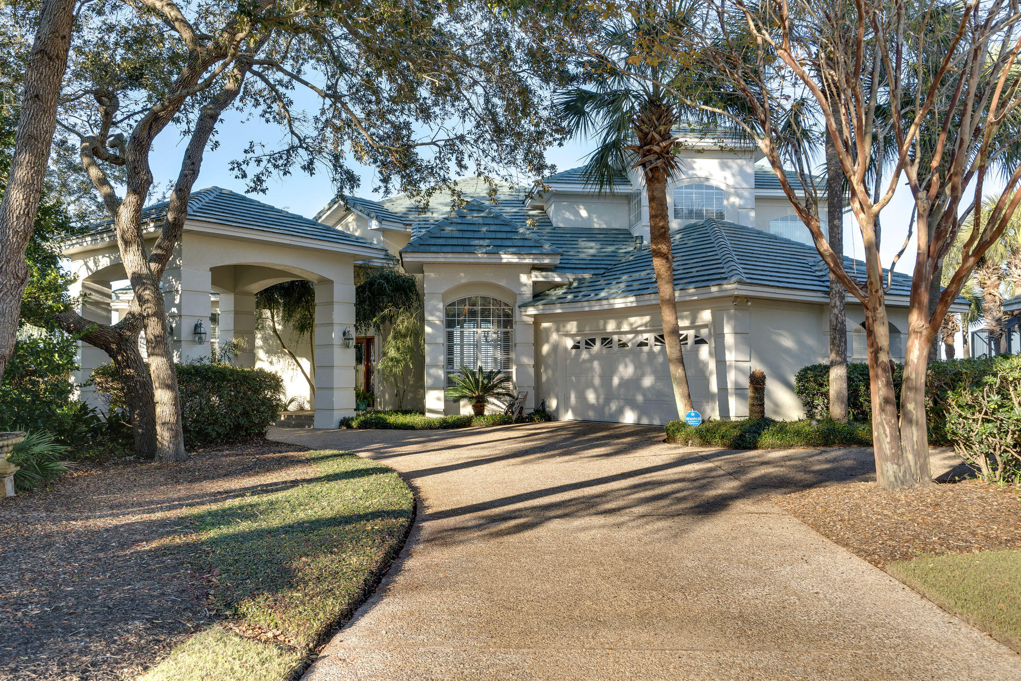 High quality and unique design pair beautifully in this 4 BR/ 3 BR bay front home with 145'water front on bay. From the stunning views, peaceful koi pond, split floor plan, fireplace, heated & enclosed and heated pool, hot tub, security system, intercom, crown molding, and multiple living areas  this home has it all! Custom Cabinets and granite countertops are featured throughout the home. The Master Suite has amazing views of the bay and of the pool. The additional bedroom next to the master could be used for so many things  a nursery, tv room, sewing / crafting room, , study or office or even a man cave! Children or guests have their own bit of privacy in the 2 upstairs bedrooms which both feature private balconies that overlook the bay. These rooms share a bathroom & sitting area.