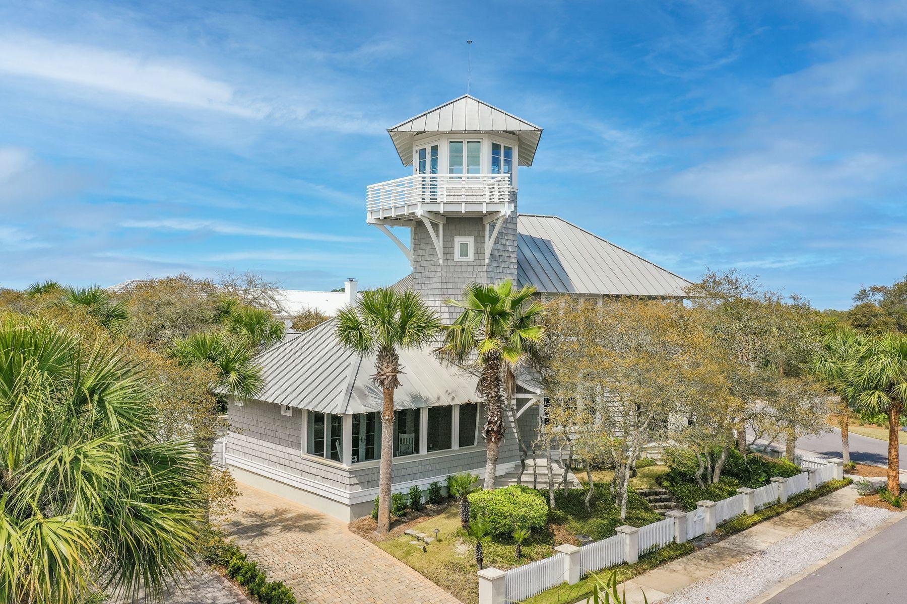CURRENTLY UNDER CONTRACT, SELLER ACCEPTING BACKUP OFFERS. Designed by the award-winning Dungan Nequette architecture team, the home has been featured in Atlanta Homes and Coastal Living magazines, and highlighted twice on HGTV. The stunning unique design of this nautical beach home is welcoming and serene. Outside, you'll first notice the beautifully manicured landscaping. Once inside, you're greeted by the custom design of the carefully crafted hardwood flooring and an eye-catching 3 story spiral staircase. Ideally situated adjacent to the iconic Carillon Bell Tower, from the top floor you have panoramic views of the picturesque community and bell tower. Gulf views are rare in Carillon, but this home's lookout tower provides a beach facing balcony for you to enjoy the Florida sun. Each of the 3 bedrooms in the main residence offers an ensuite bathroom, with private balcony access from the master suite. This never-before rented home also includes a separate 1-bedrooom carriage house for added privacy and comfort for your guests. Settled on the footpath to the beach, you have direct access to the 7 beach pavilions, each one unique from another, leading to the emerald water and pure white sand. After enjoying a day at the beach you can either wind down in your second floor Florida Room, on your balcony swing, or in your upscale kitchen preparing a family meal on your commercial quality gas range. The French Doors in the dining area invite the outside in for a truly relaxing salt air experience. Not only will you be able to enjoy the Gulf front pool in this community, but you are just steps away from the famous restaurants and shops located in Carillon Beach. Whether you're playing tennis or basketball in Bellview Park, or taking an evening stroll down the promenade, this house is perfect for someone looking to experience a blissful lifestyle.