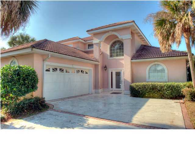 This is a spectacular 3 bedroom 3 bath home in the Emerald Bay Subdivision in Destin. The home has a grand feeling with very high ceilings, beautiful wood floors, a fireplace and an awesome covered swimming pool!! The kitchen is a cook's dream with stainless appliances and granite counter tops. Call today to see this gem of a rental property! The home is being rented unfurnished and does not allow pets.